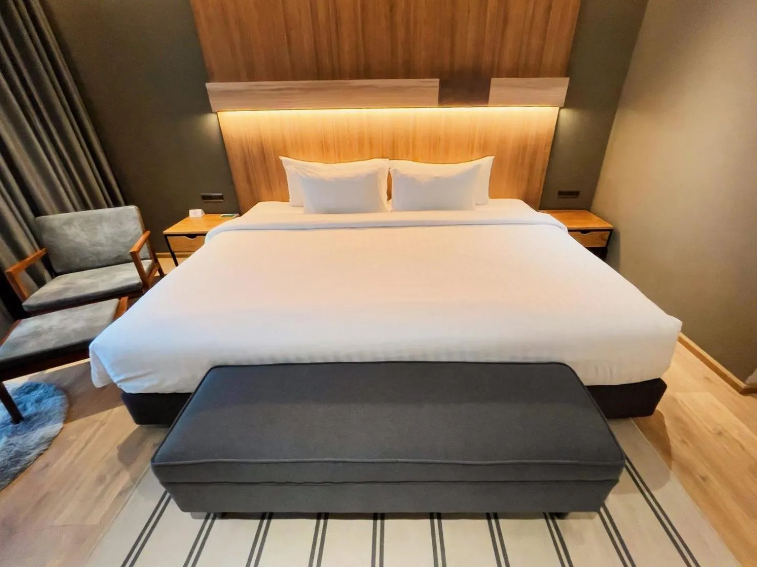 Bed in The Teak Hotel