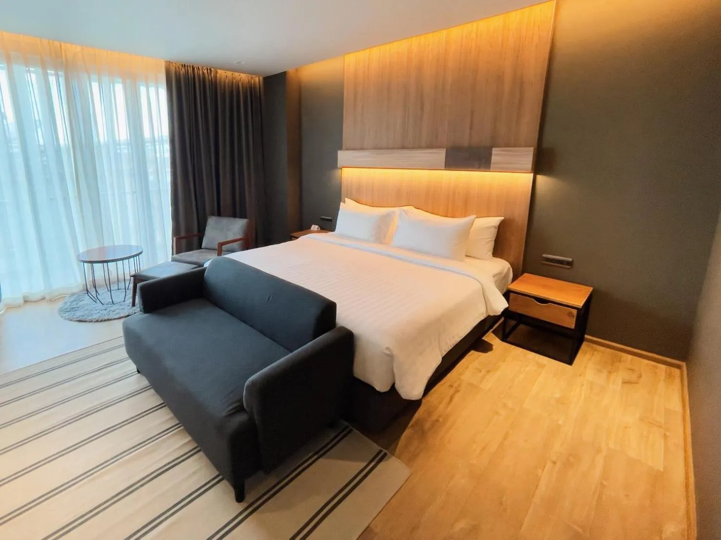 Bed in The Teak Hotel