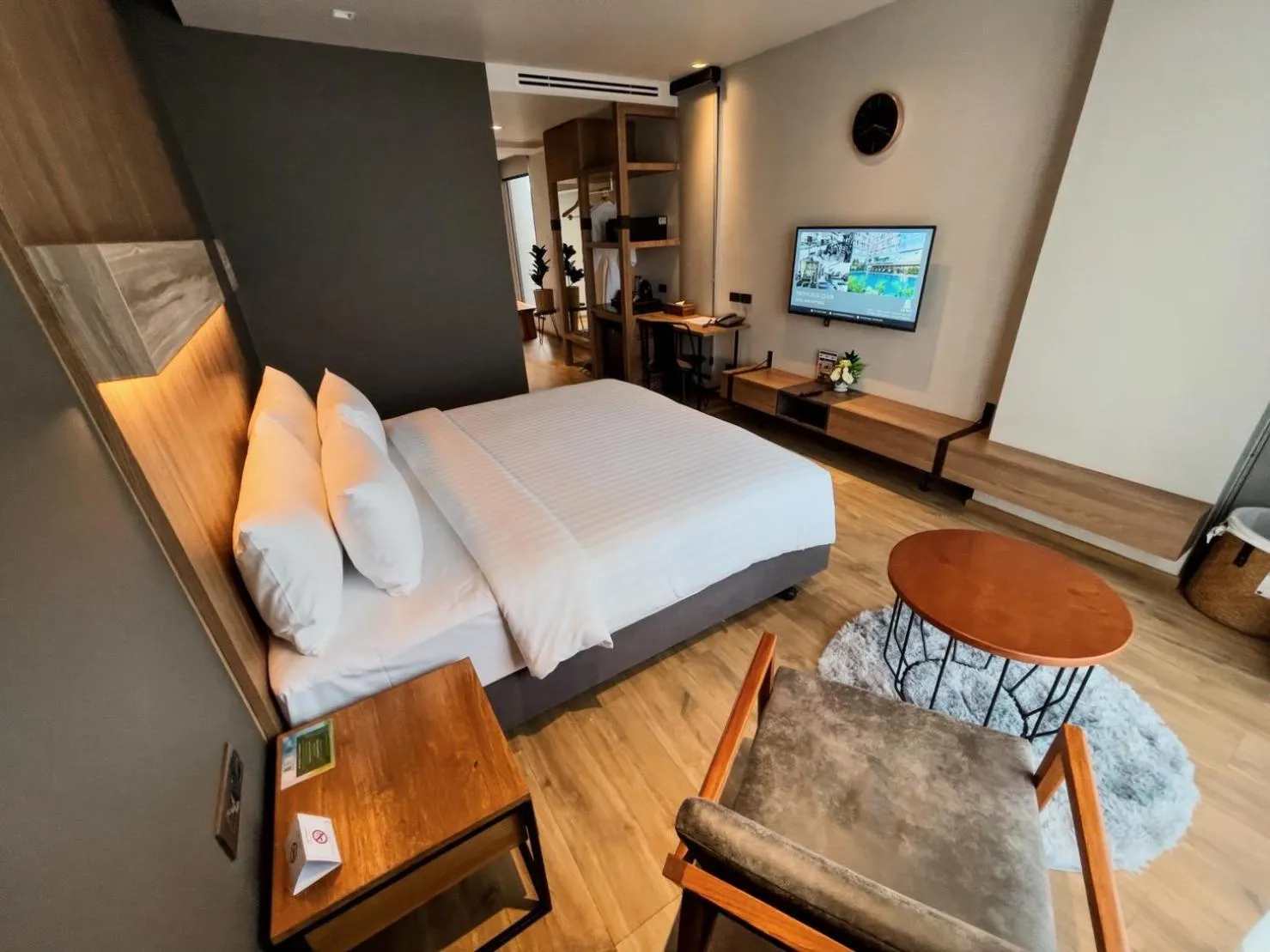 Bed in The Teak Hotel