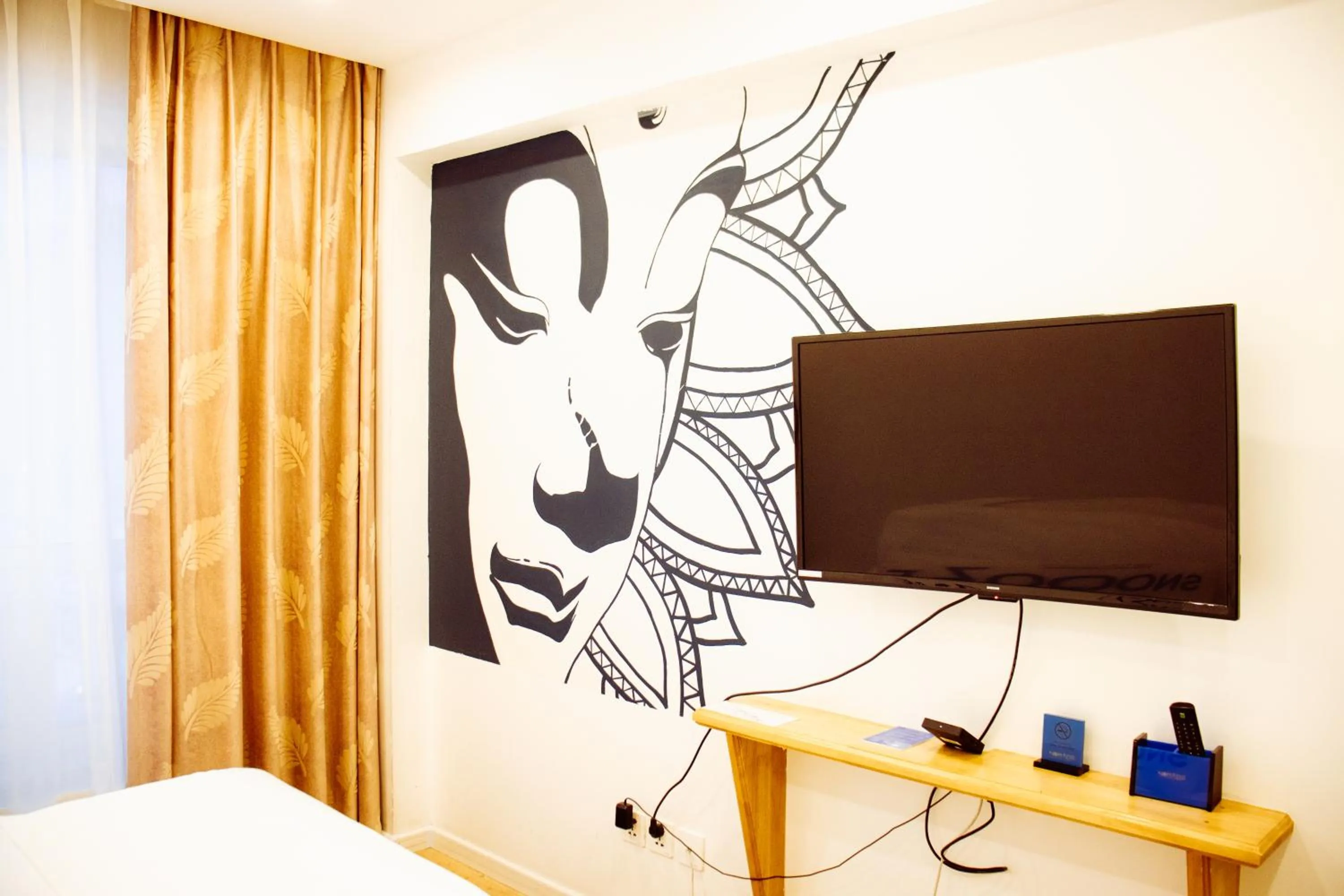 TV and multimedia in Nomado Boutique Hotel