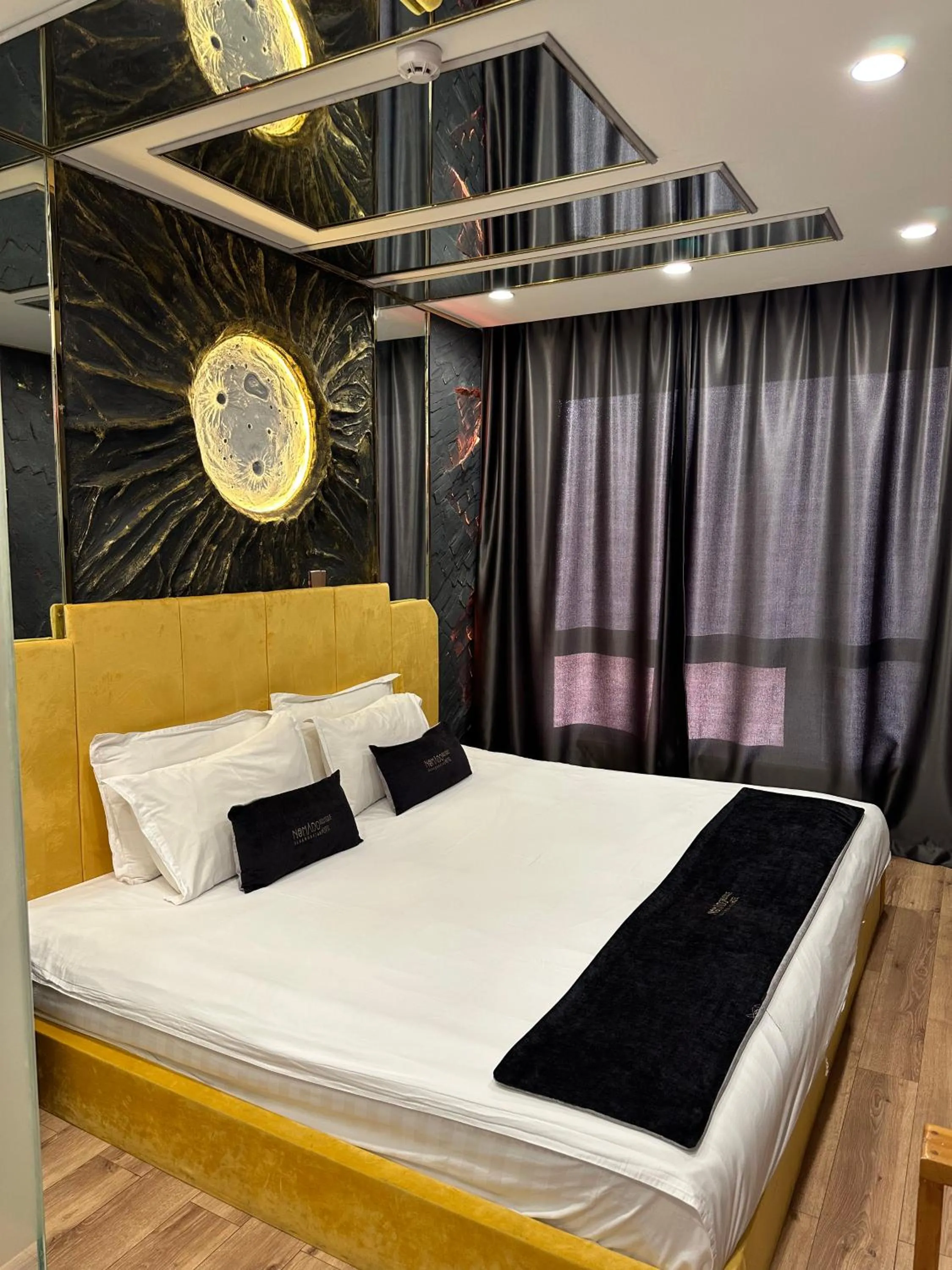 Bed in Nomado Boutique Hotel