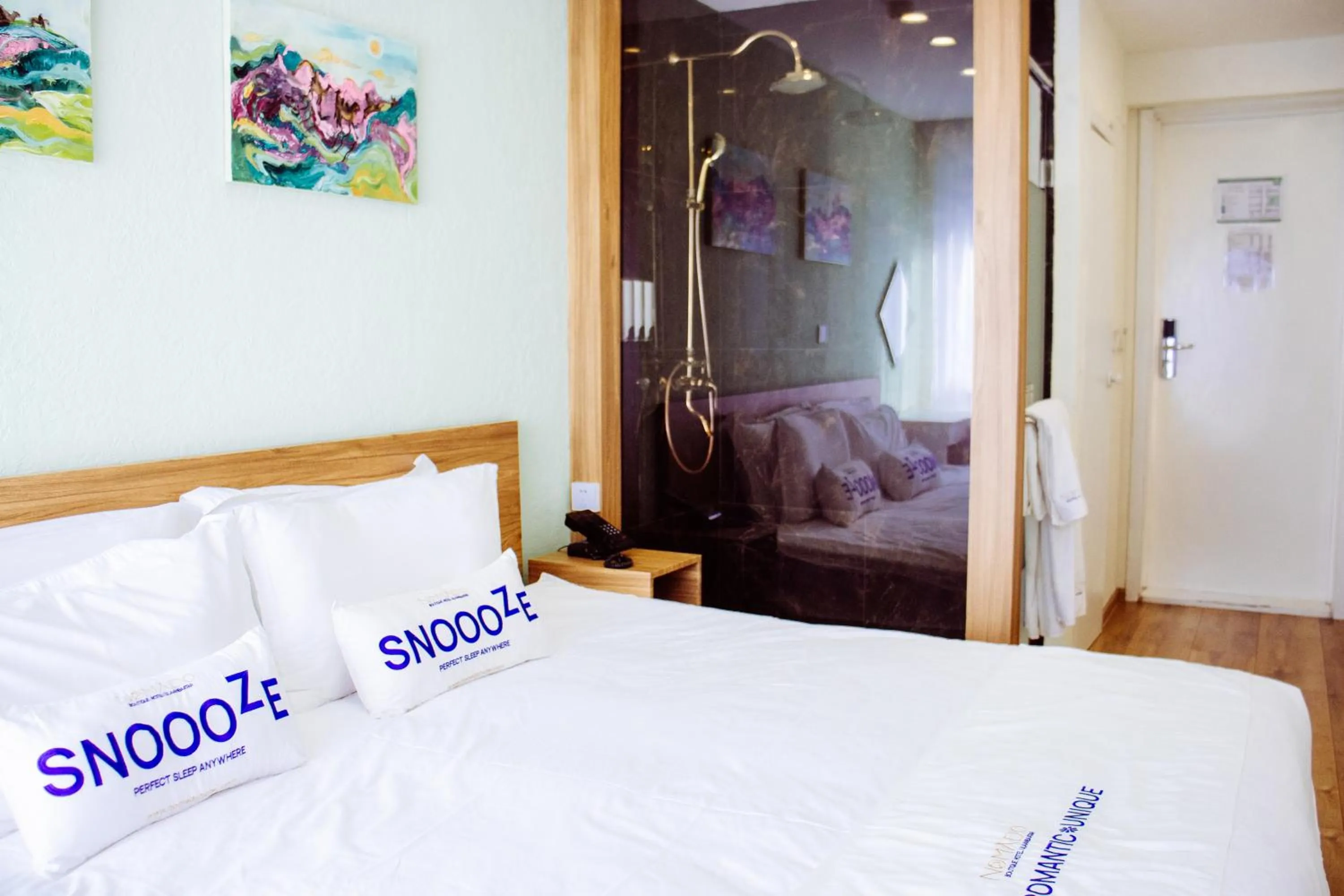 Bed in Nomado Boutique Hotel