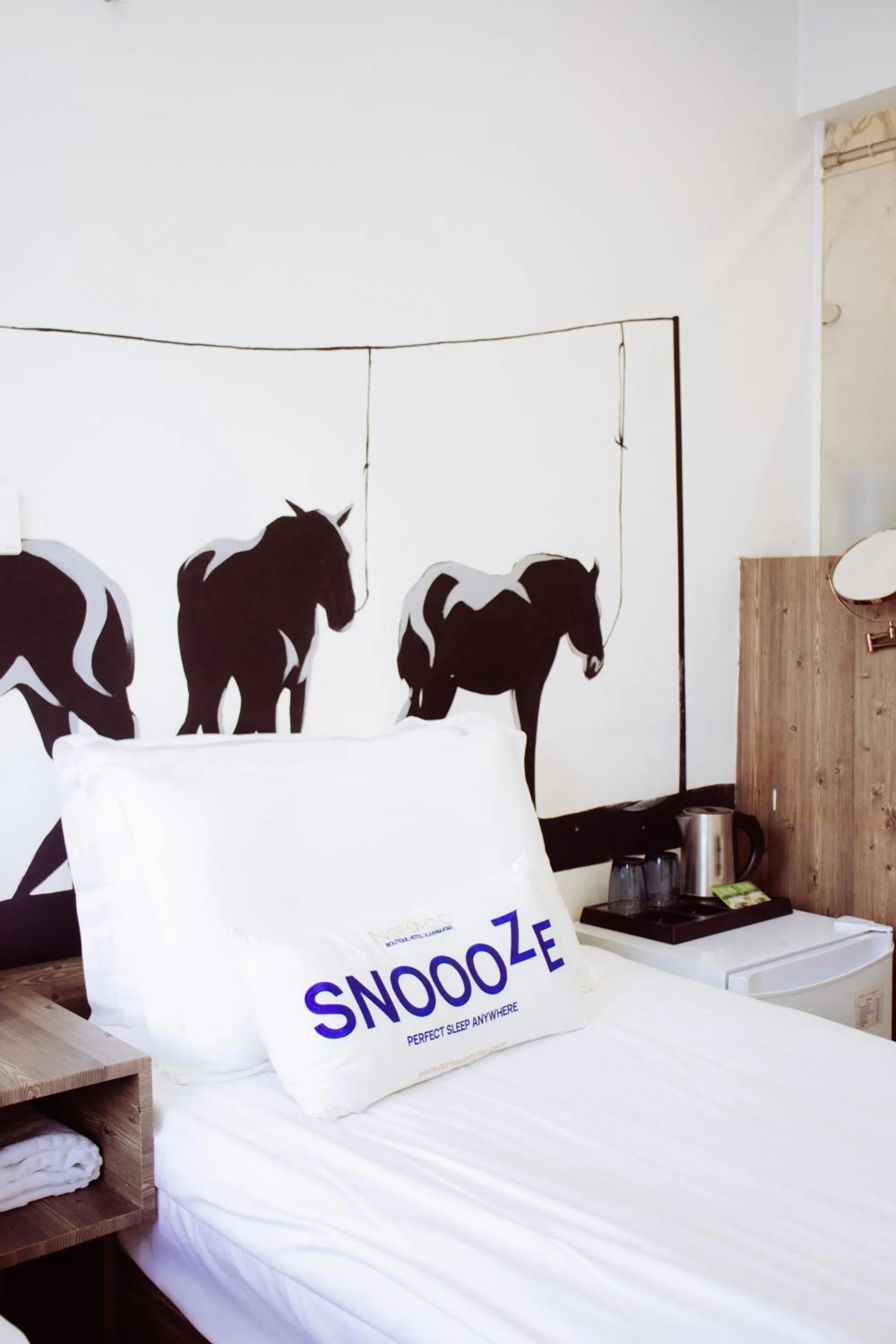 Bed in Nomado Boutique Hotel