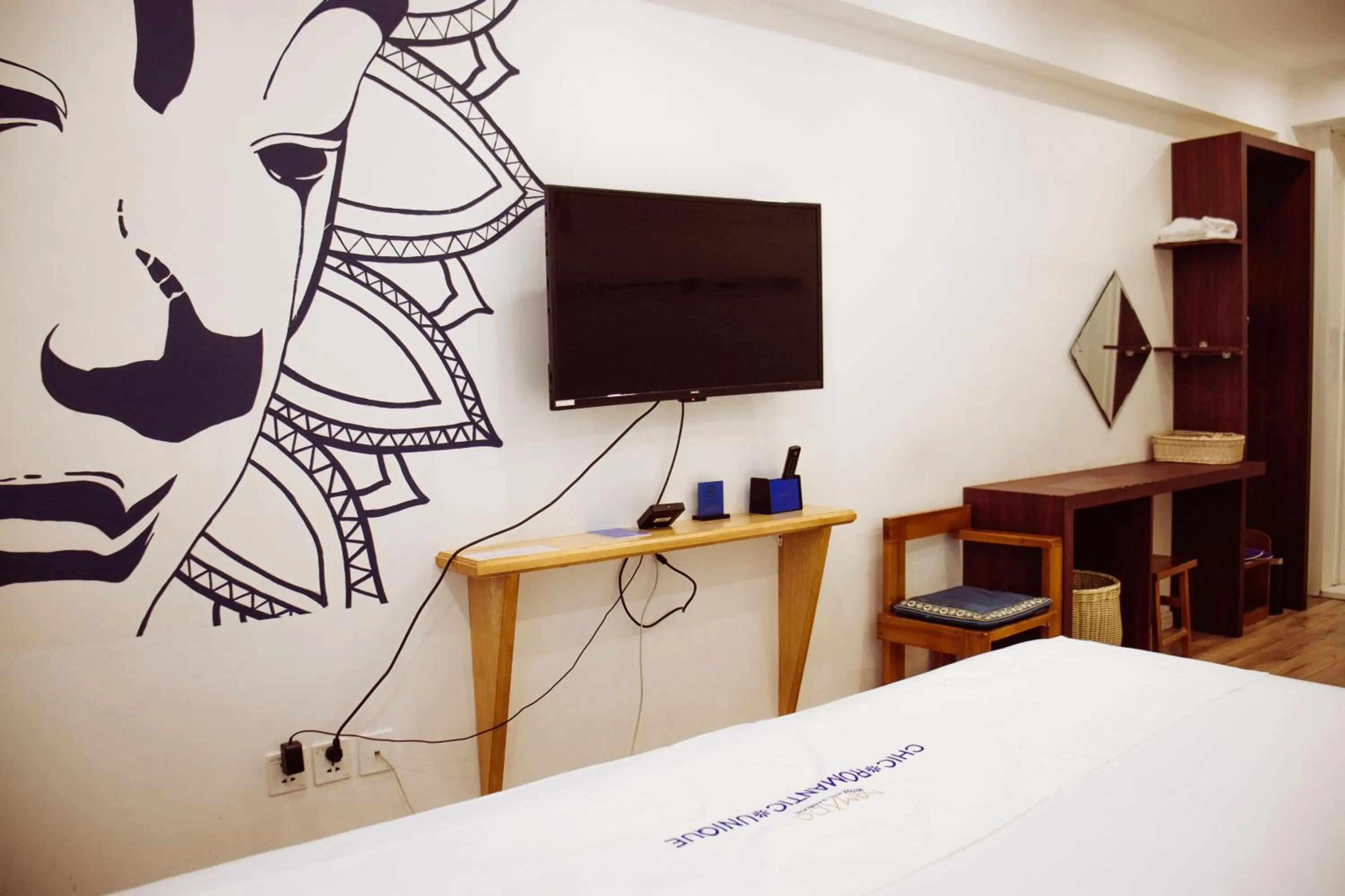 TV and multimedia, Bed in Nomado Boutique Hotel