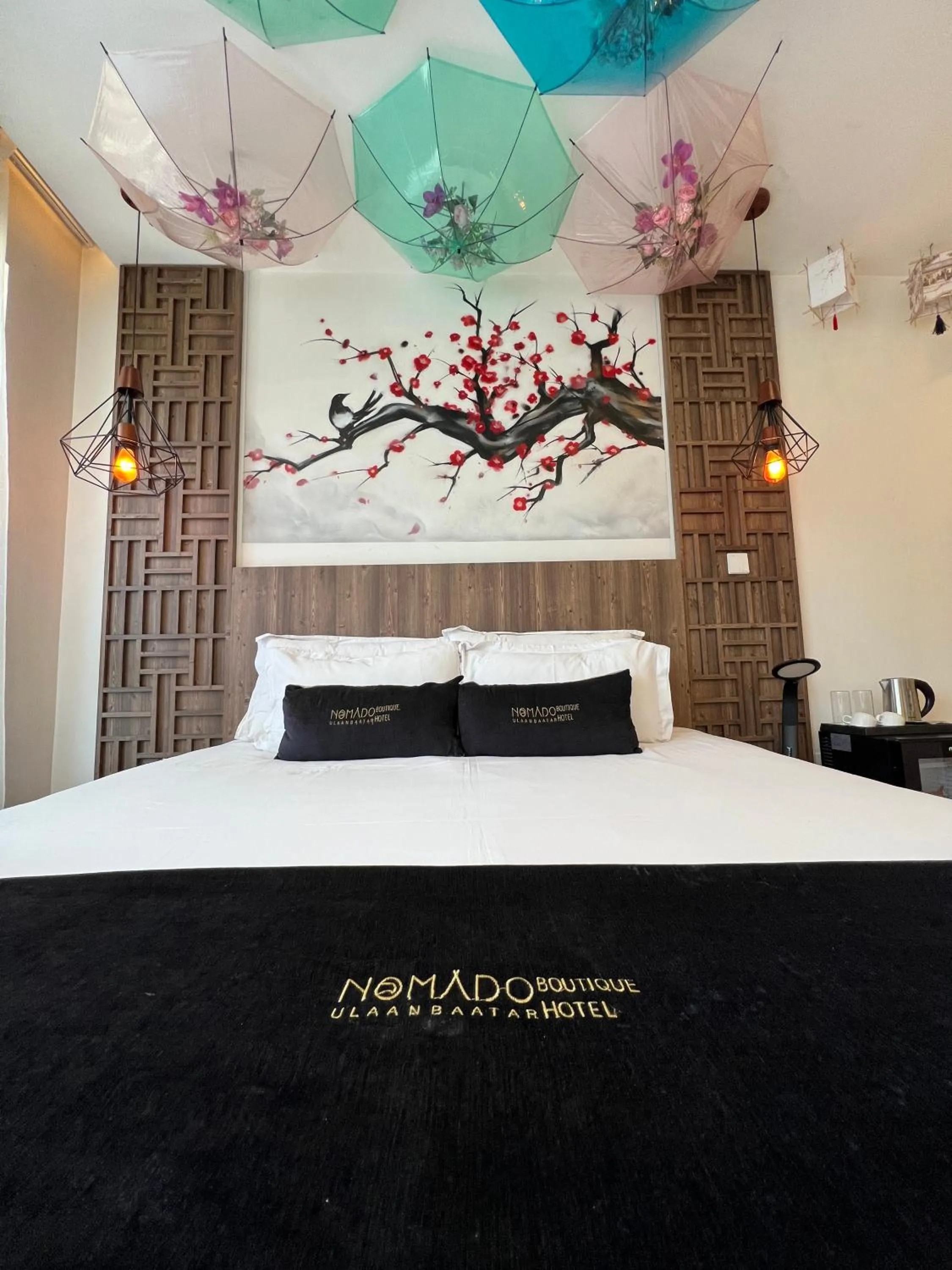 Bed in Nomado Boutique Hotel