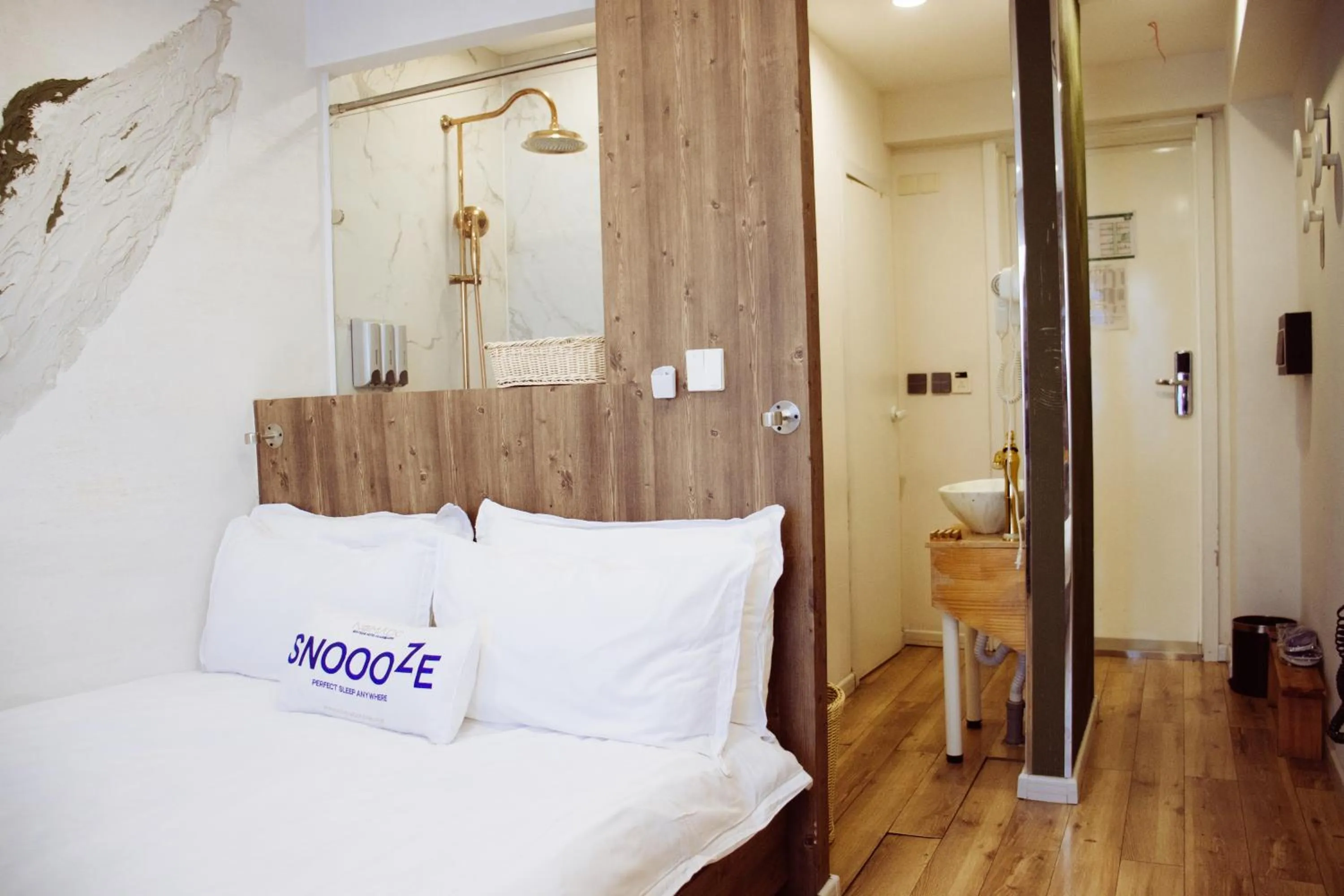 Bed in Nomado Boutique Hotel