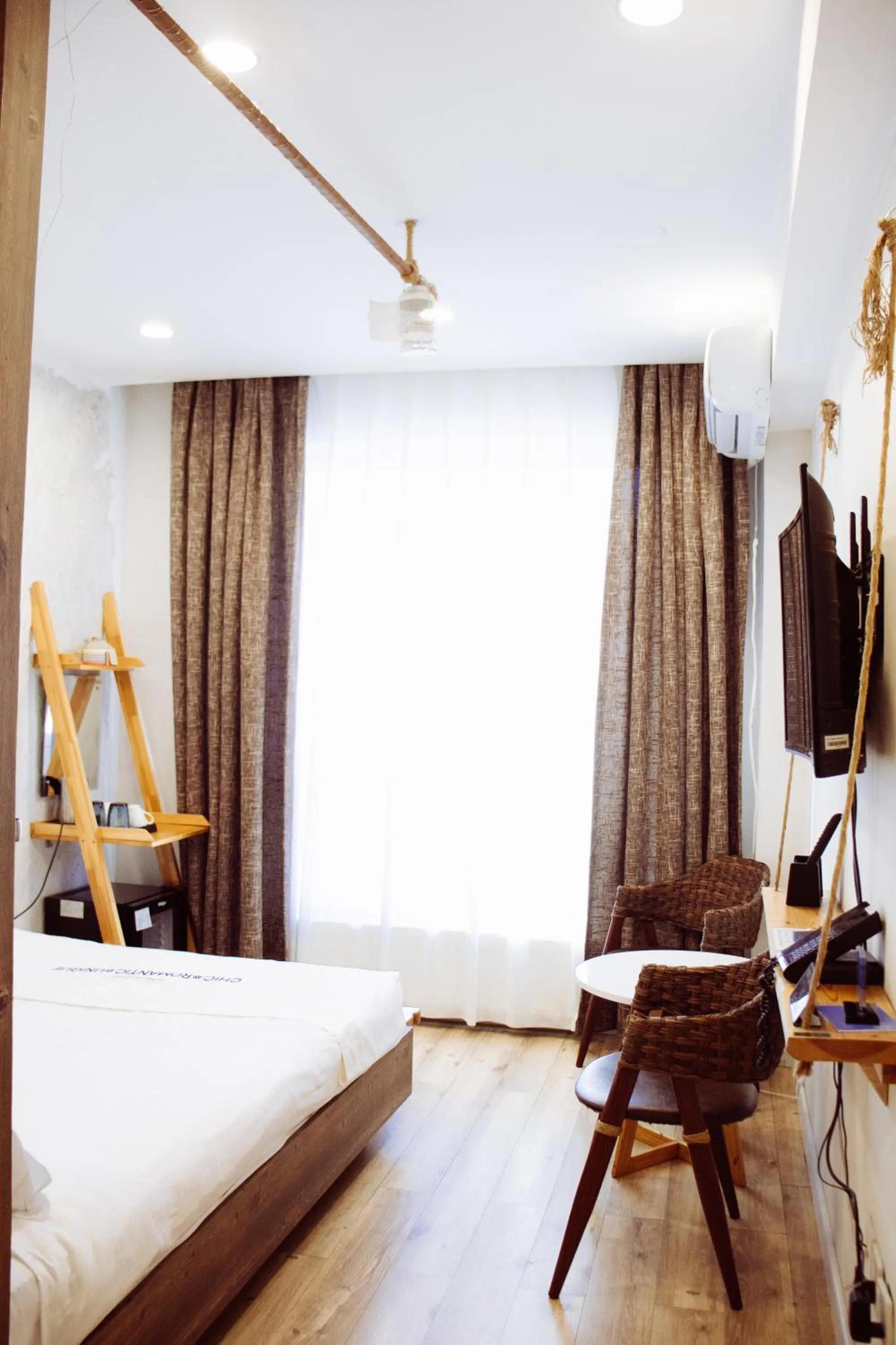 Photo of the whole room, Bed in Nomado Boutique Hotel