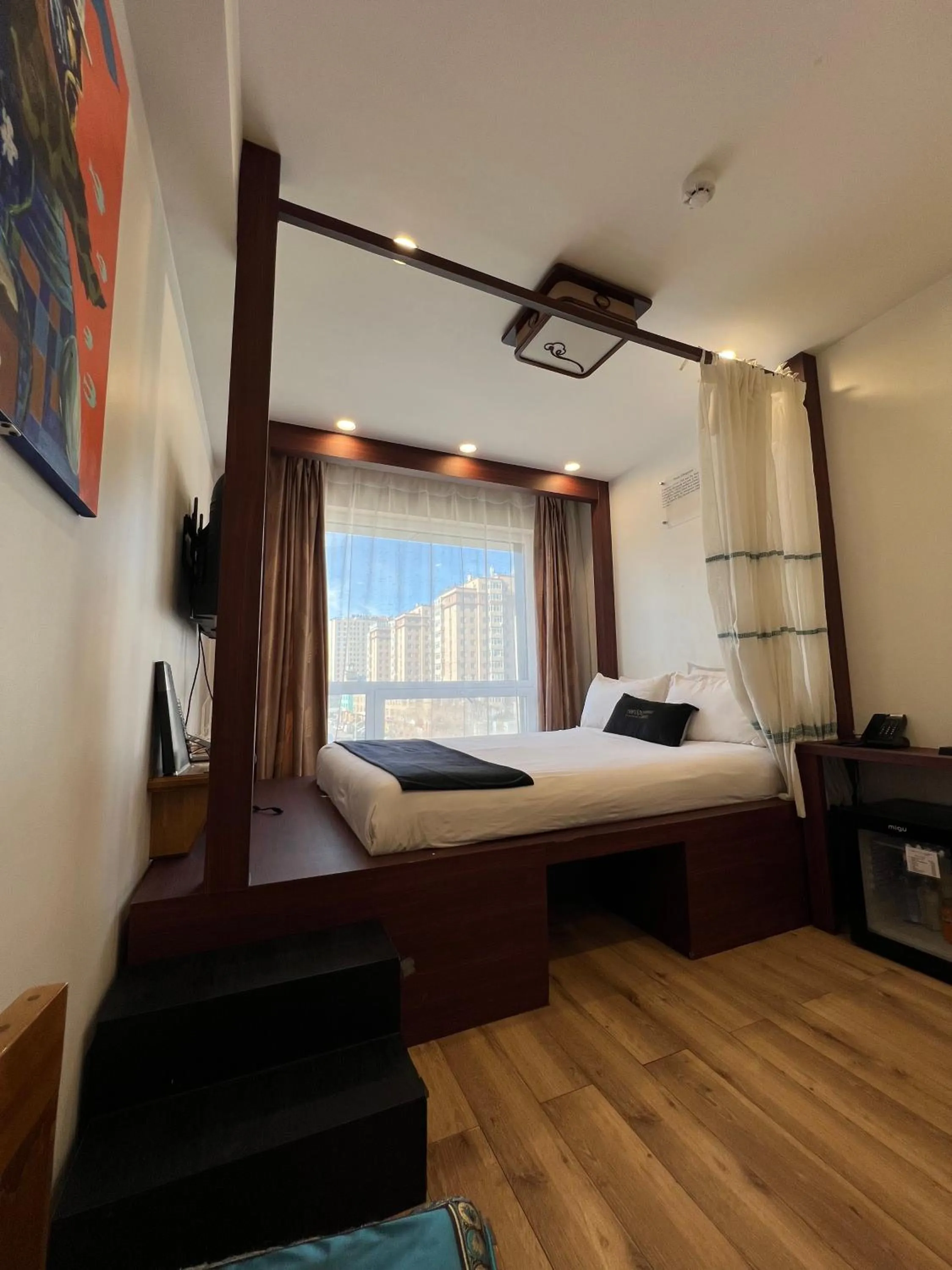 Bed in Nomado Boutique Hotel