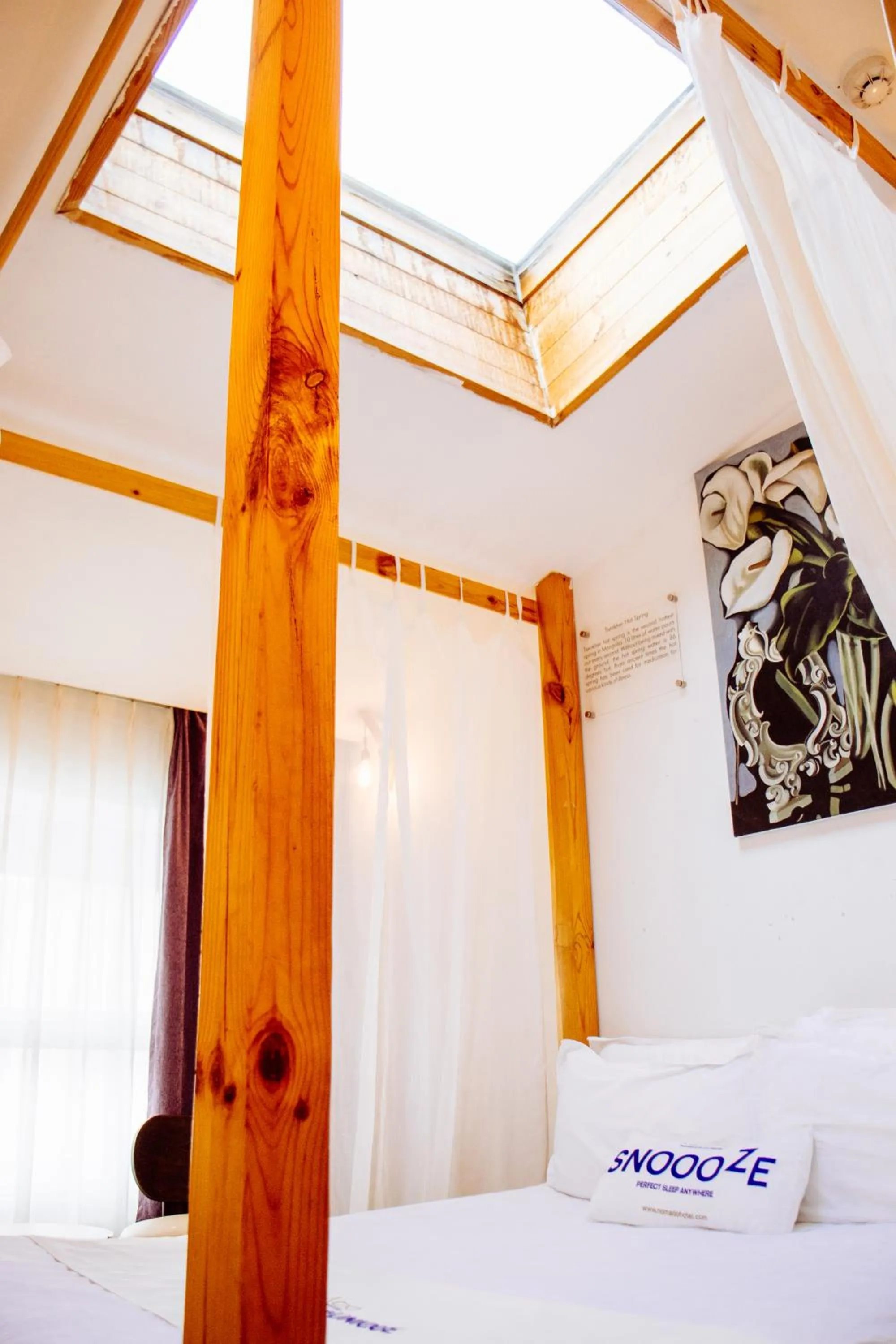 Bed in Nomado Boutique Hotel