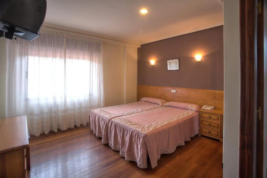 Bed in Hotel Lusitano