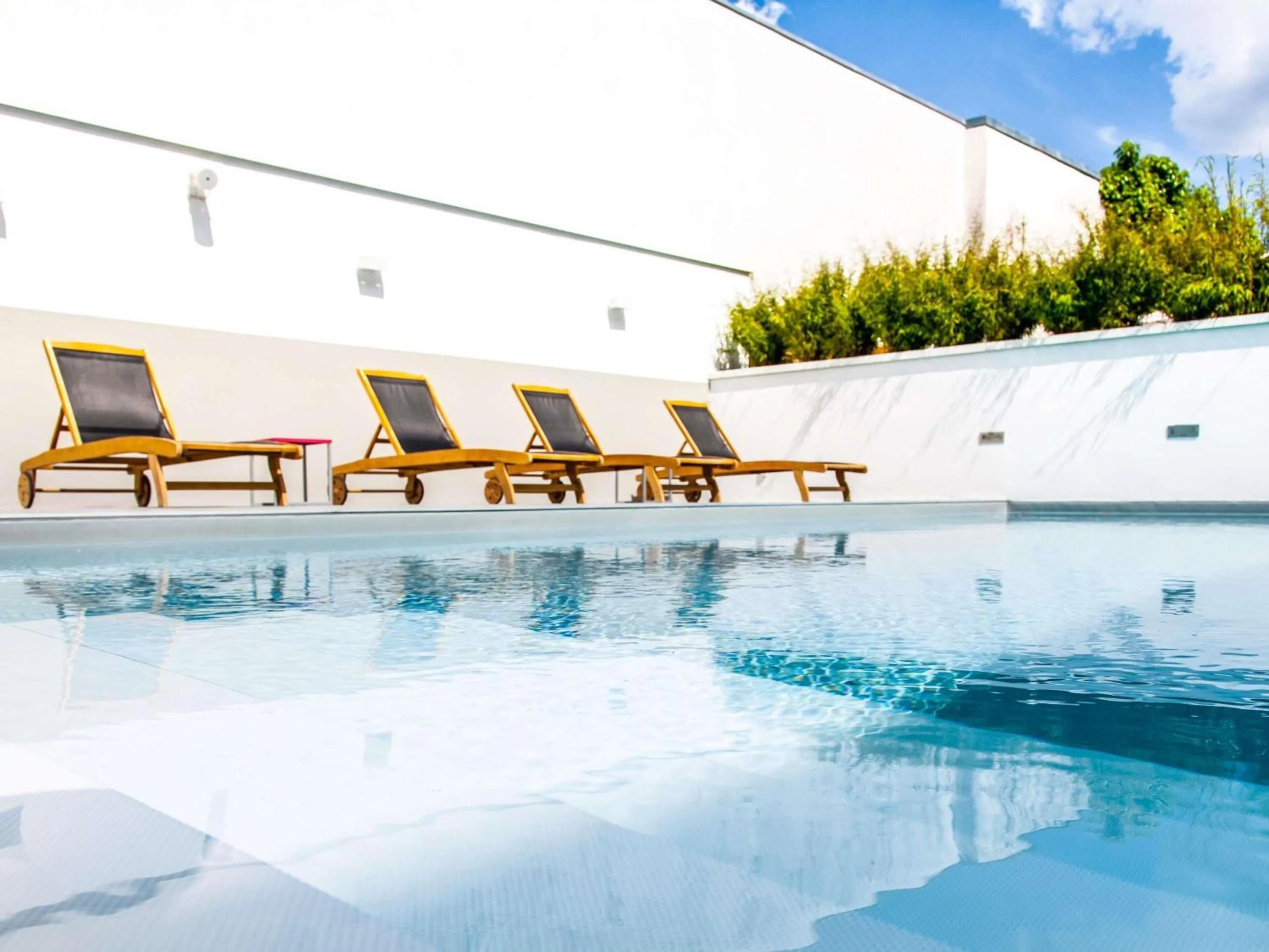 Pool view in Novotel Blois Centre Val De Loire