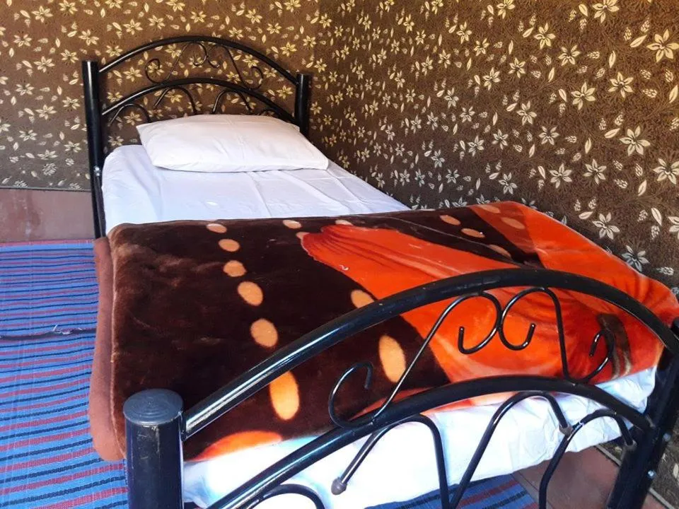Bed in WadiRum Mobile Camp