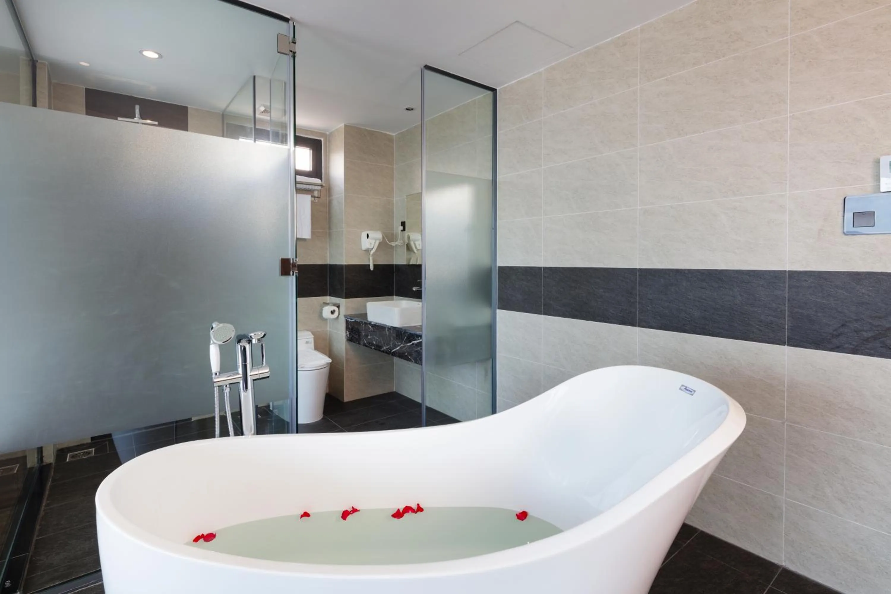 Bathroom in Amber Hotel managed by HT