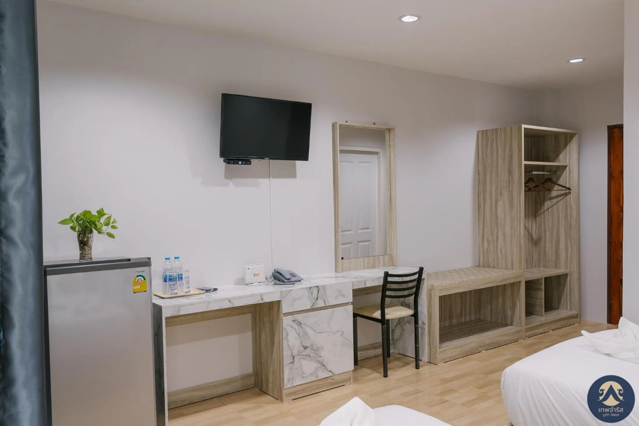 Bed in Thepchamrat Boutique Hotel