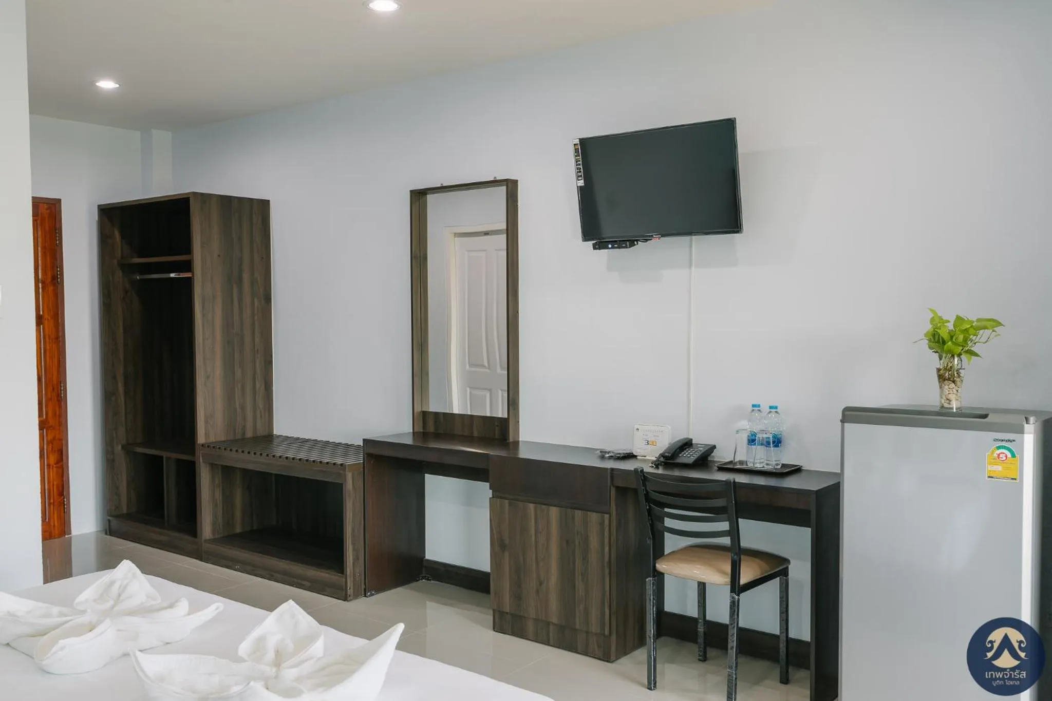 Bed in Thepchamrat Boutique Hotel