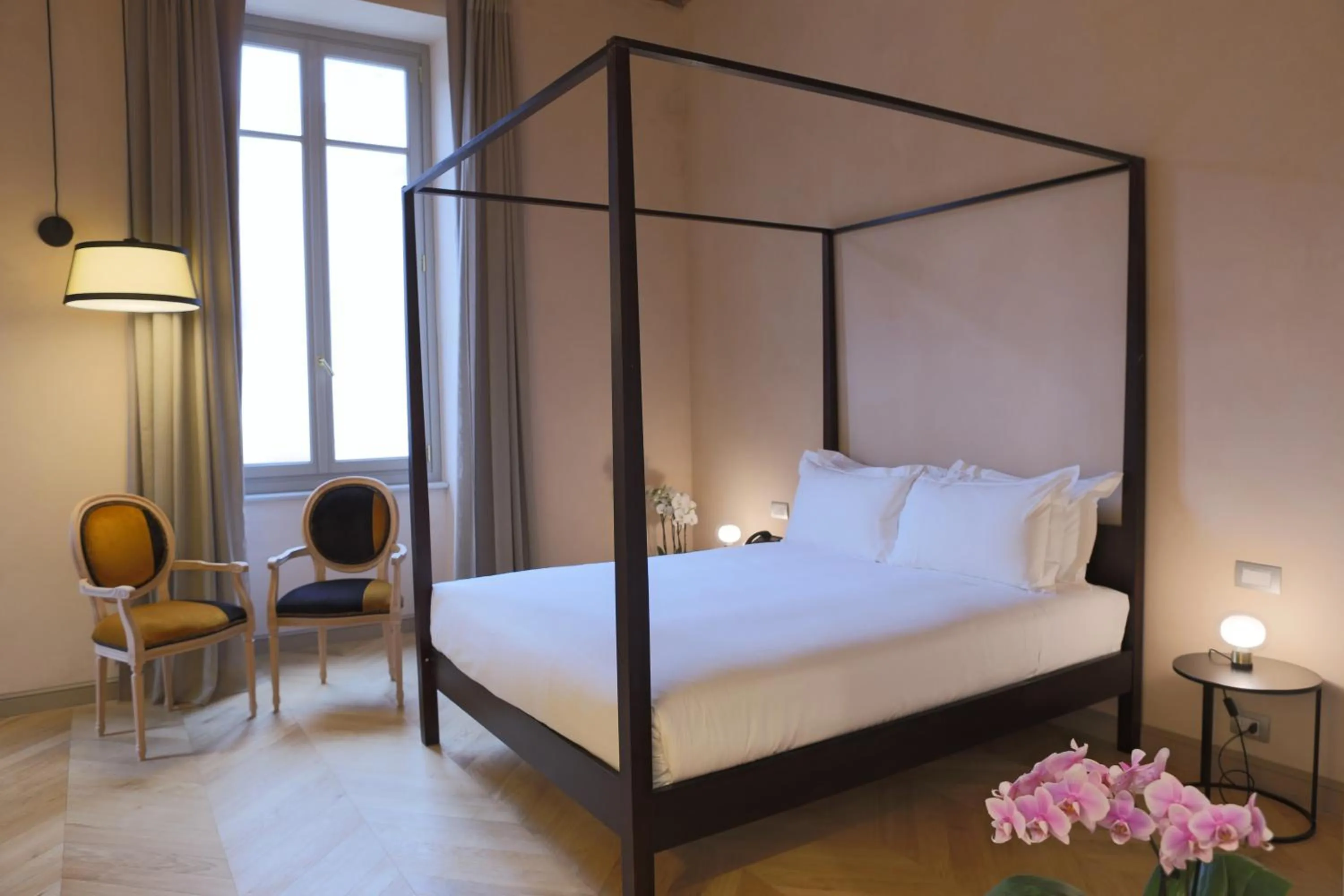 Bed in Opera35 Boutique Hotel