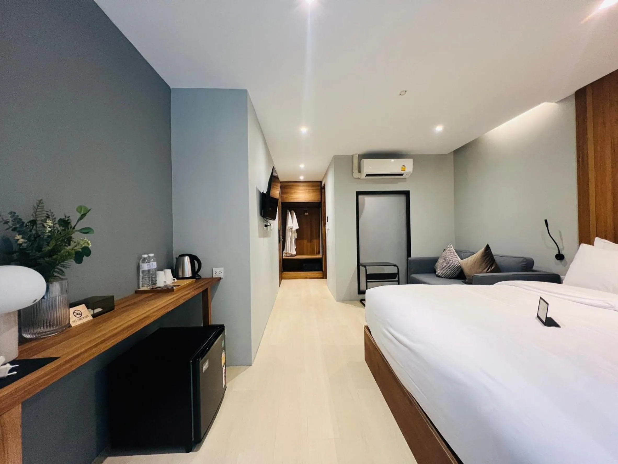 Bed in Woodstory Boutique Hotel