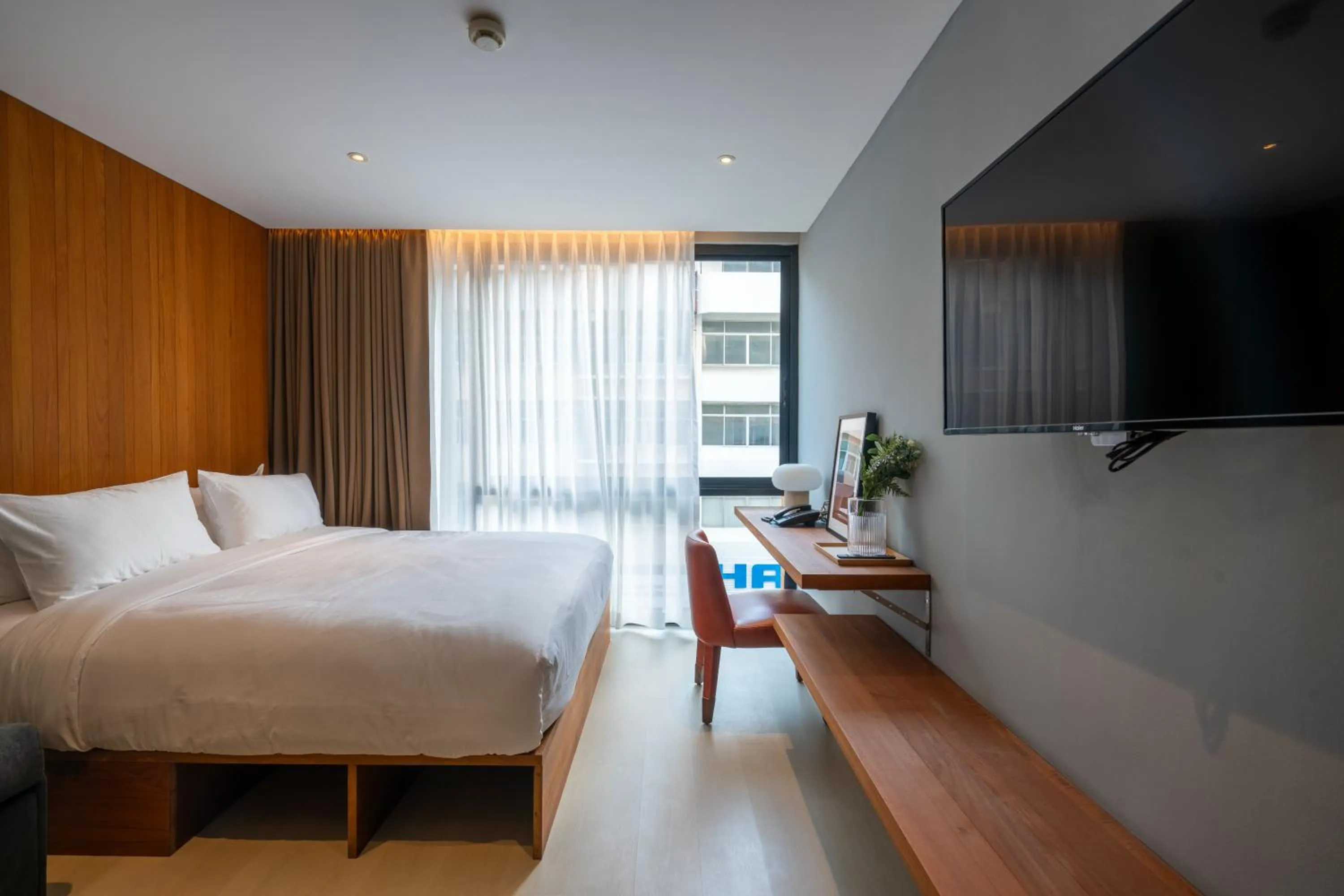 Bed in Woodstory Boutique Hotel