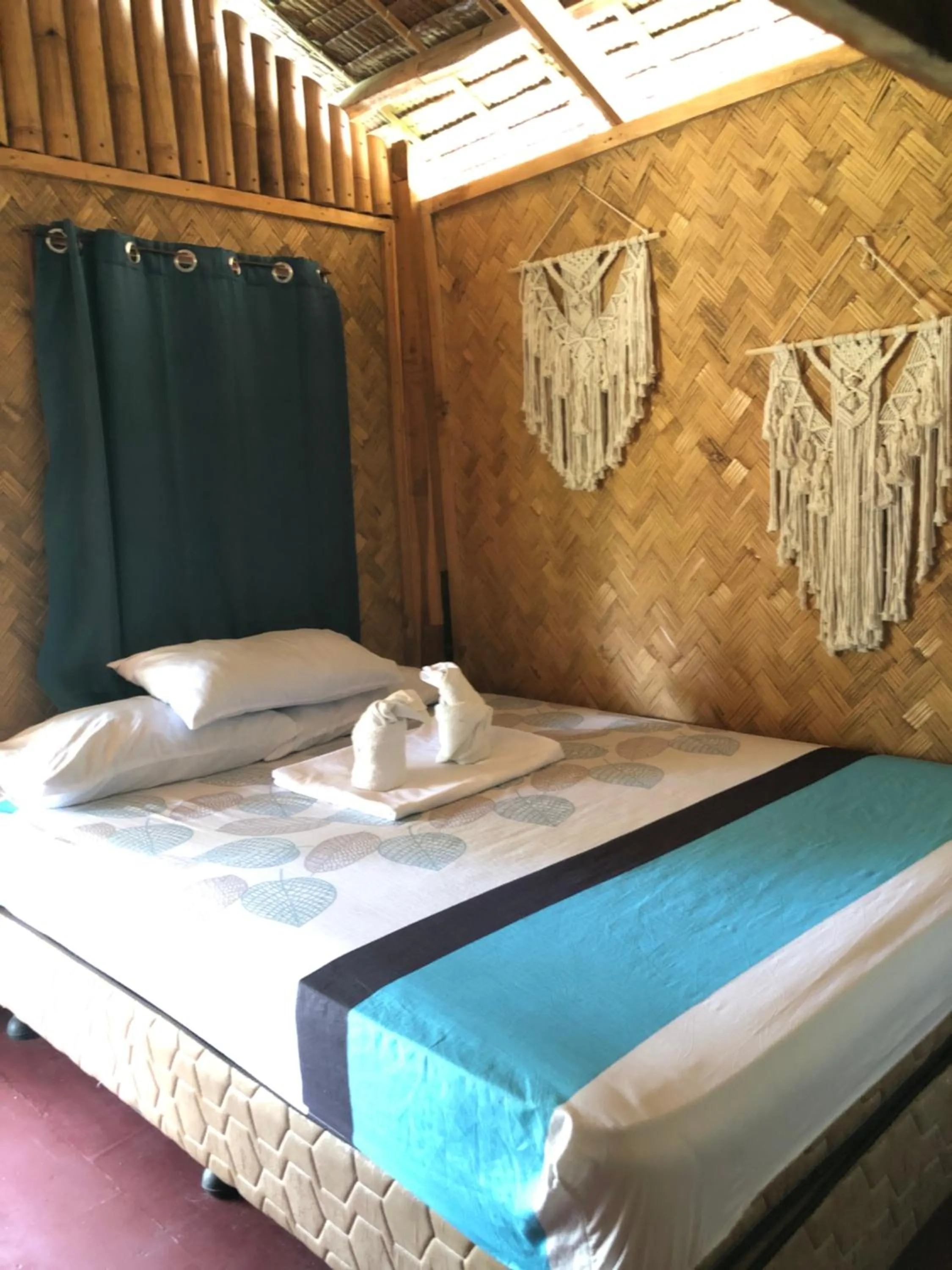 Bed in Zhaya's Beach & Cottages