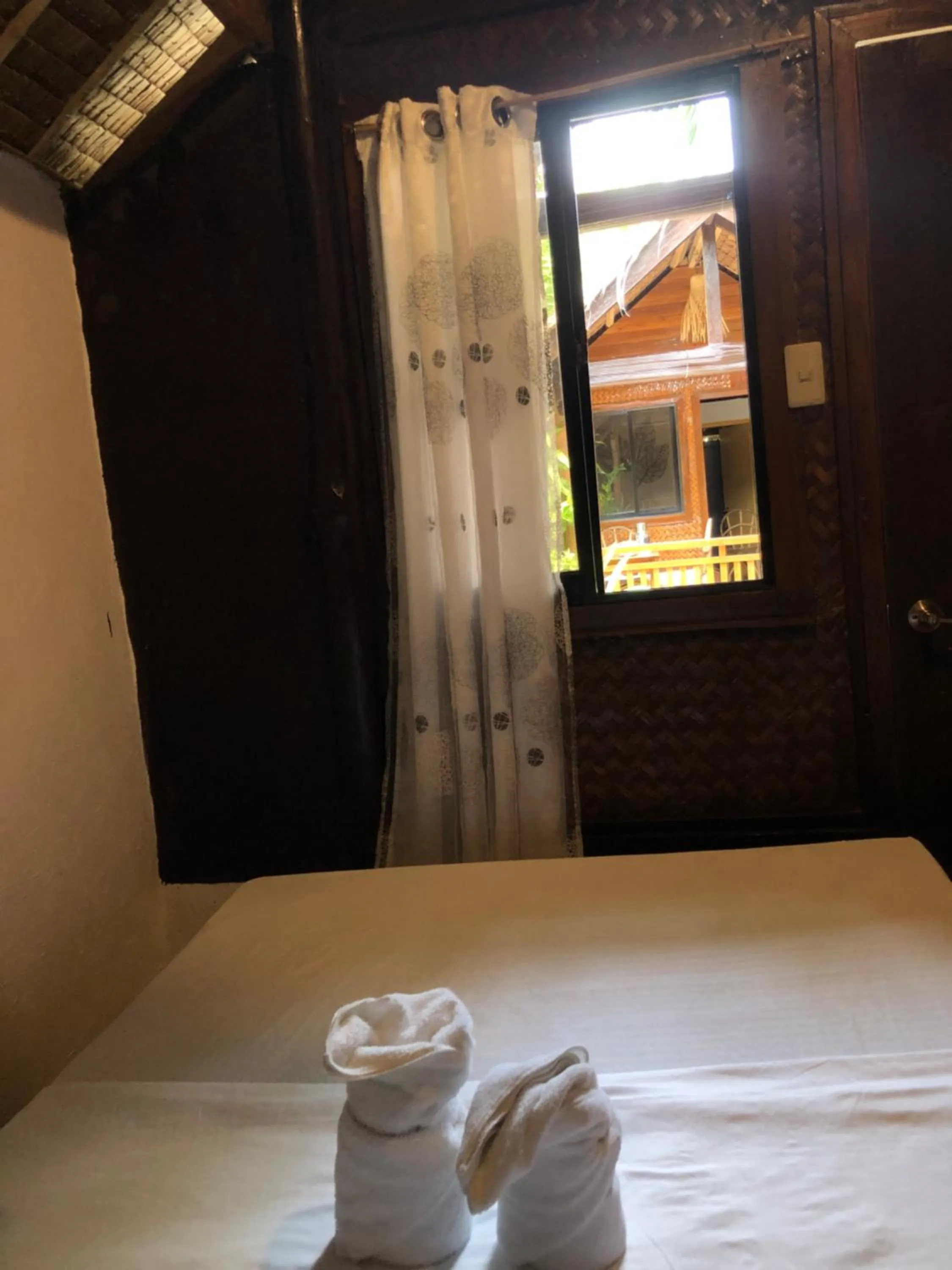 Bed in Zhaya's Beach & Cottages