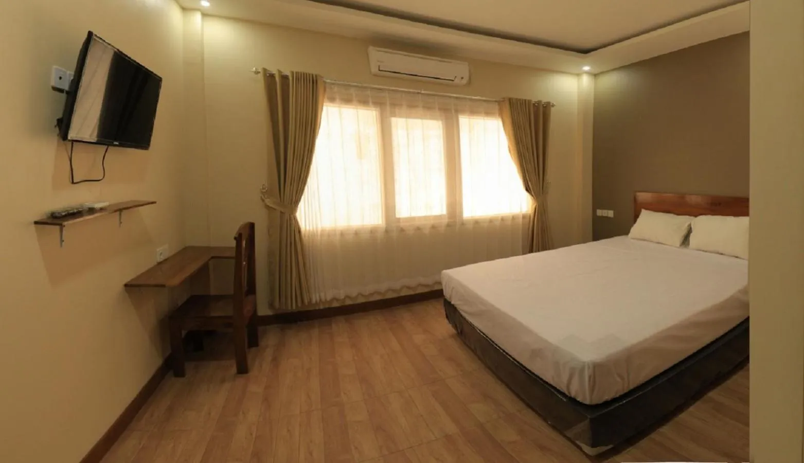 Photo of the whole room, Bed in Bluefire Homestay Syariah