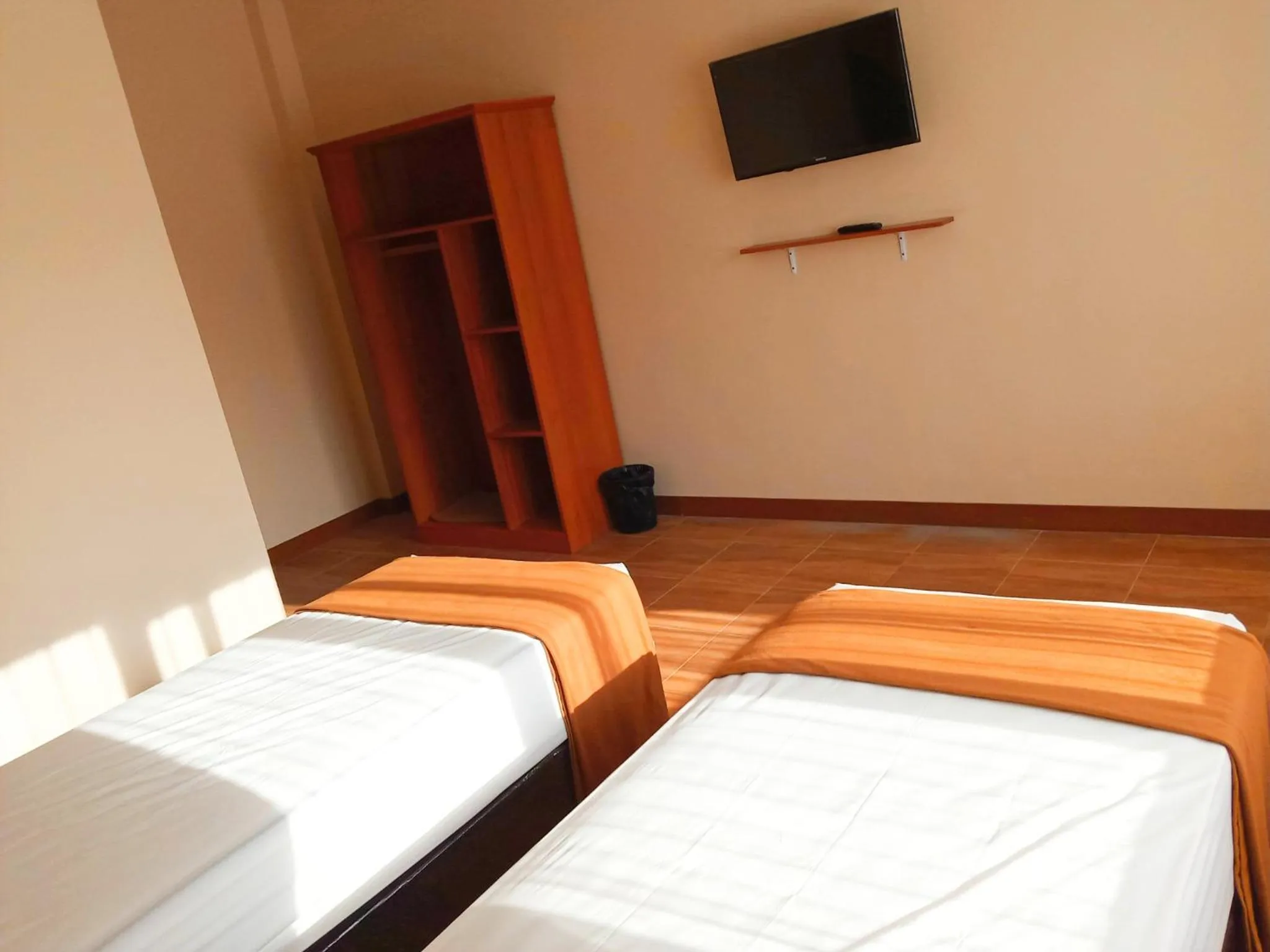 Photo of the whole room, Bed in Bluefire Homestay Syariah