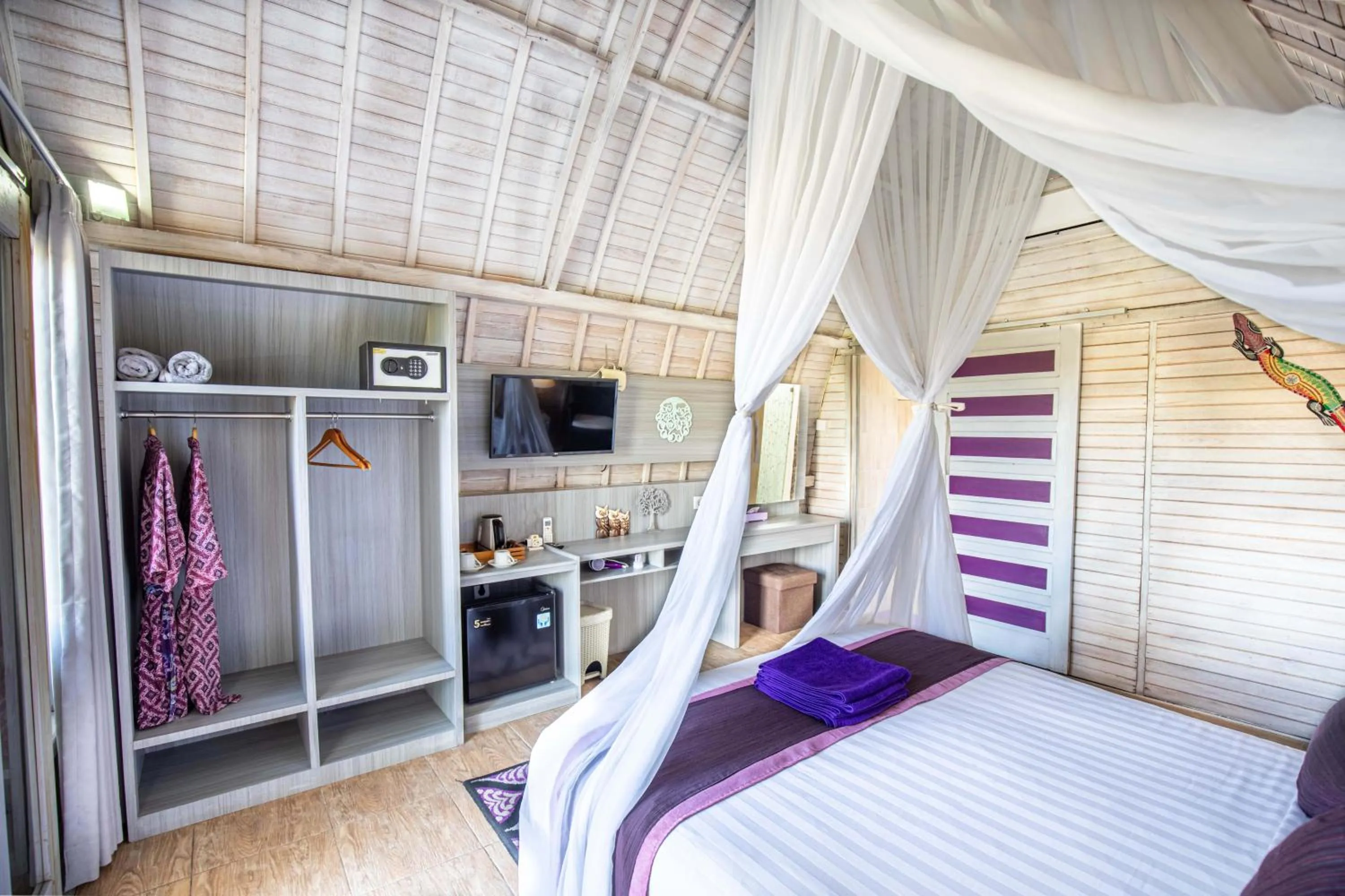 Bed in Akusara Jungle Resort And Spa