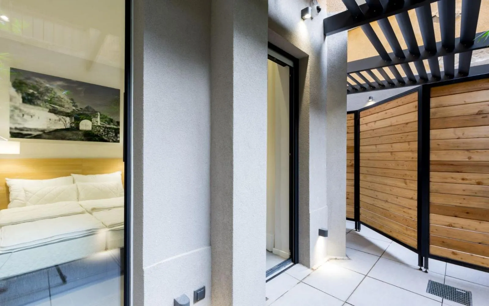 Seating area, Bed in Teanna Lux Apartments