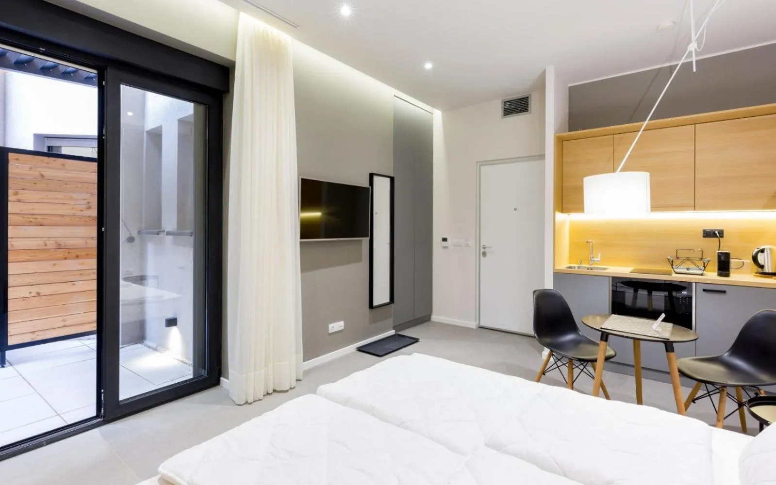 Kitchen or kitchenette, Bed in Teanna Lux Apartments