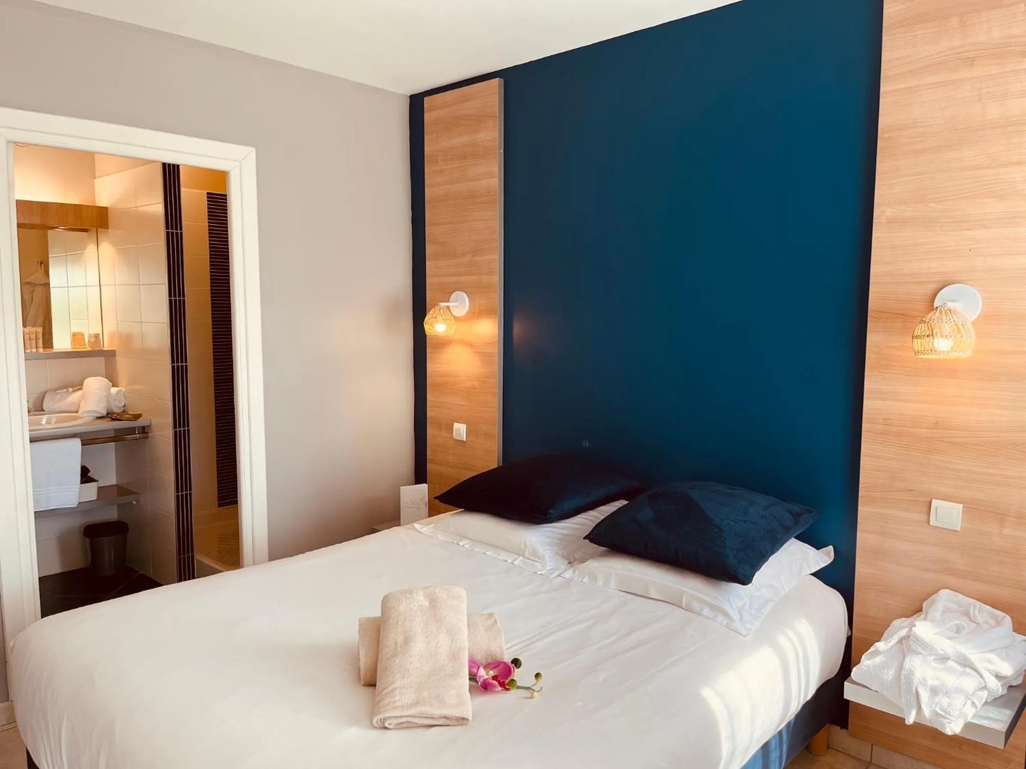 Bed in Résidence Hôtelière Natureva & Spa