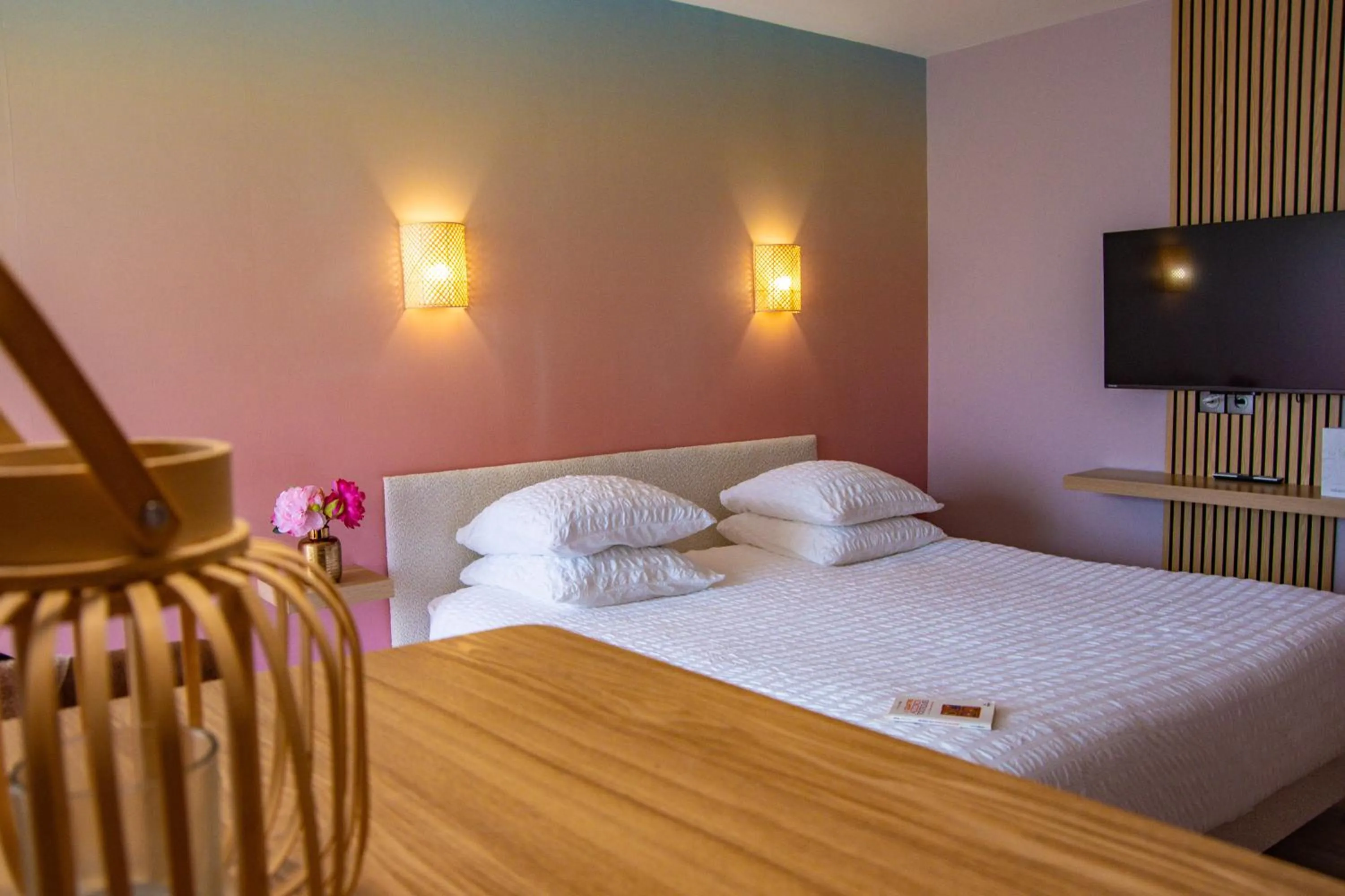 Bed in Résidence Hôtelière Natureva & Spa