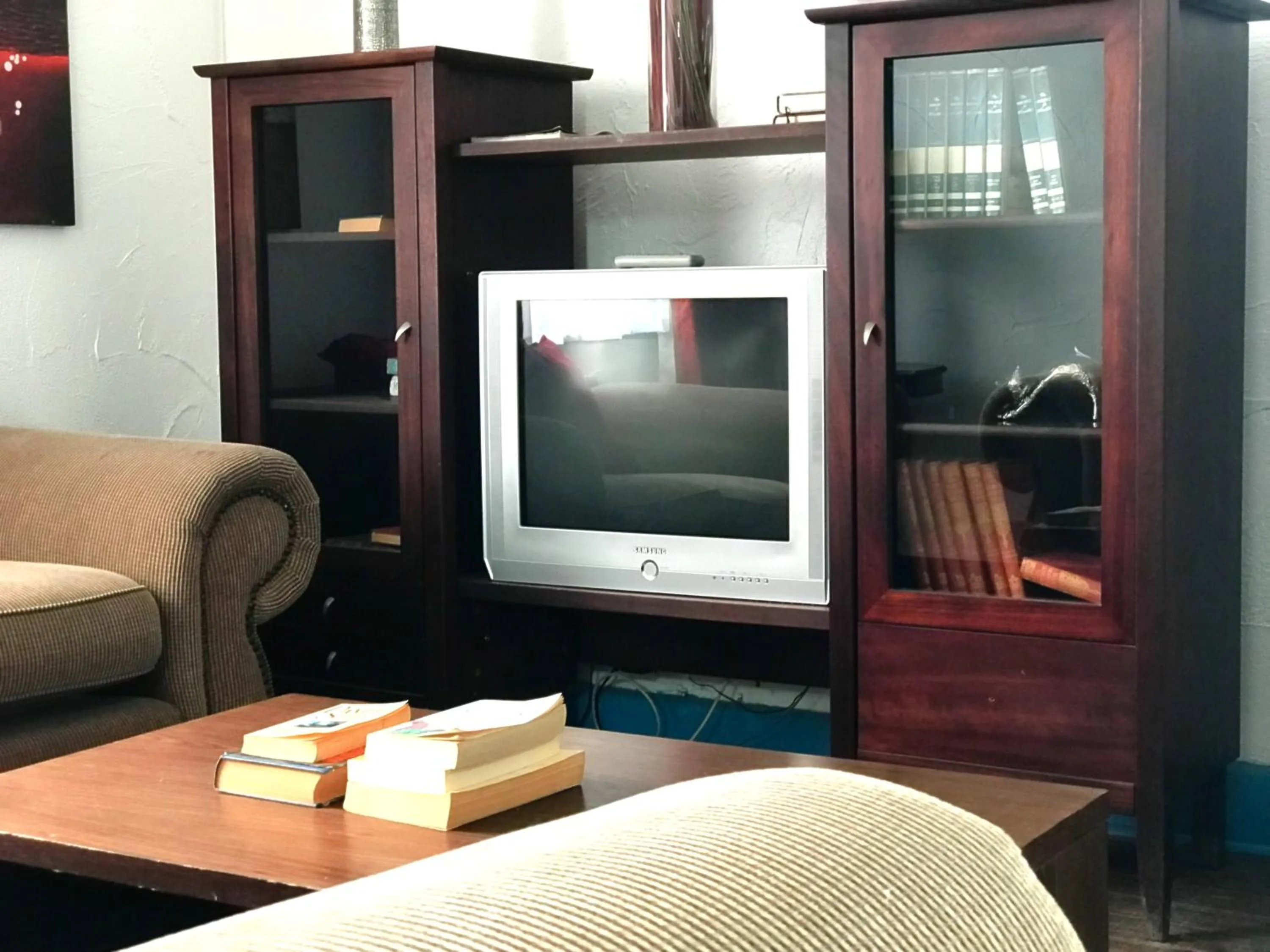 Communal lounge/ TV room in Athenian Villa