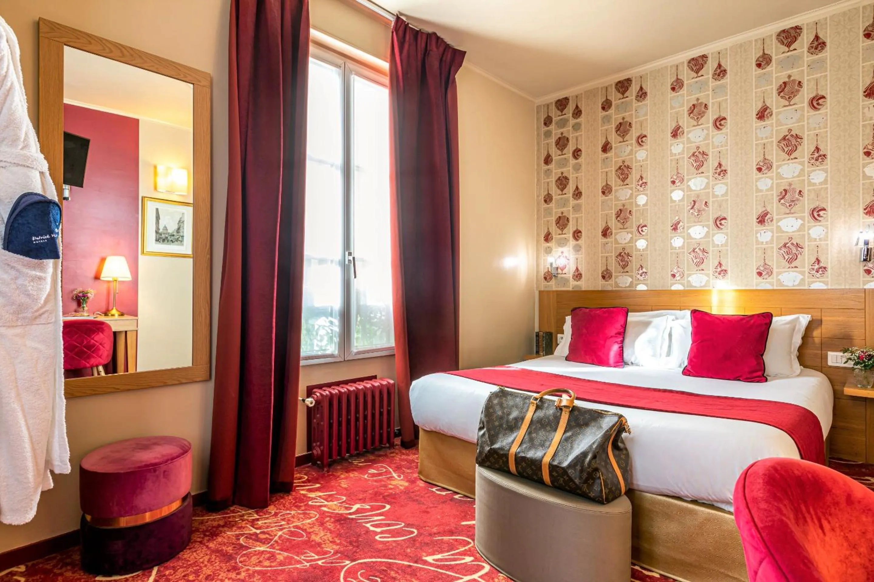 Bed in Hotel Romance Malesherbes by Patrick Hayat