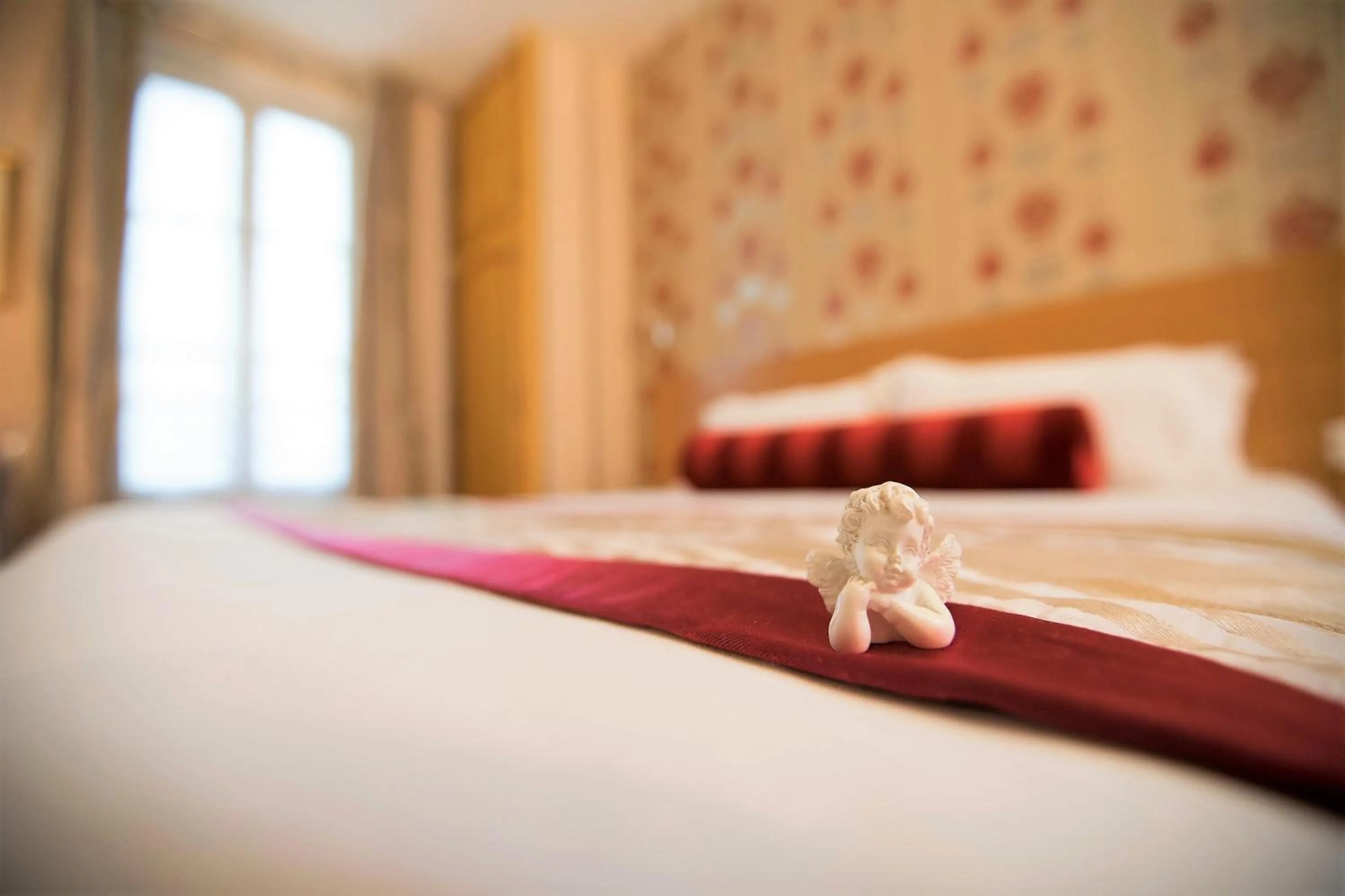 Bed in Hotel Romance Malesherbes by Patrick Hayat