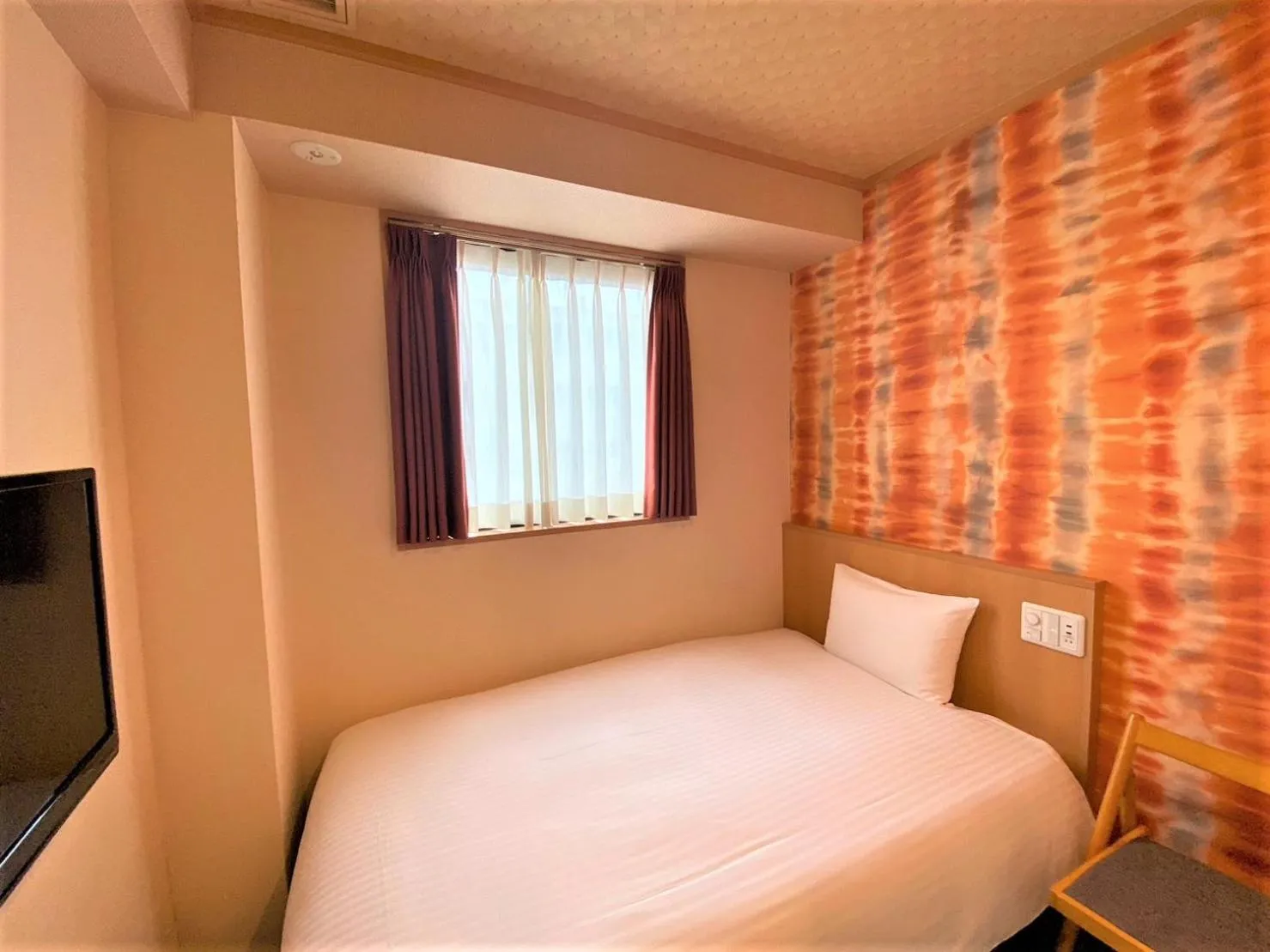 Bed in SAKURA SKY HOTEL KASHIWA(桜スカイホテル柏)