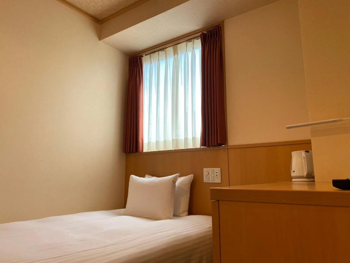 Bed in SAKURA SKY HOTEL KASHIWA(桜スカイホテル柏)