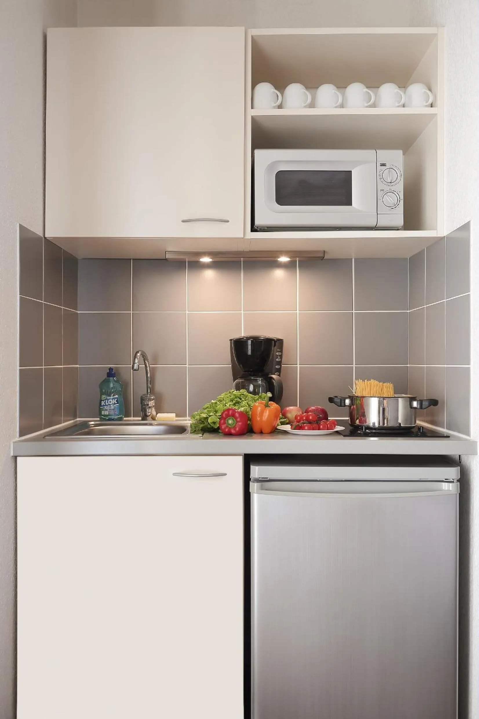 Kitchen or kitchenette in Aparthotel Adagio Access Avignon
