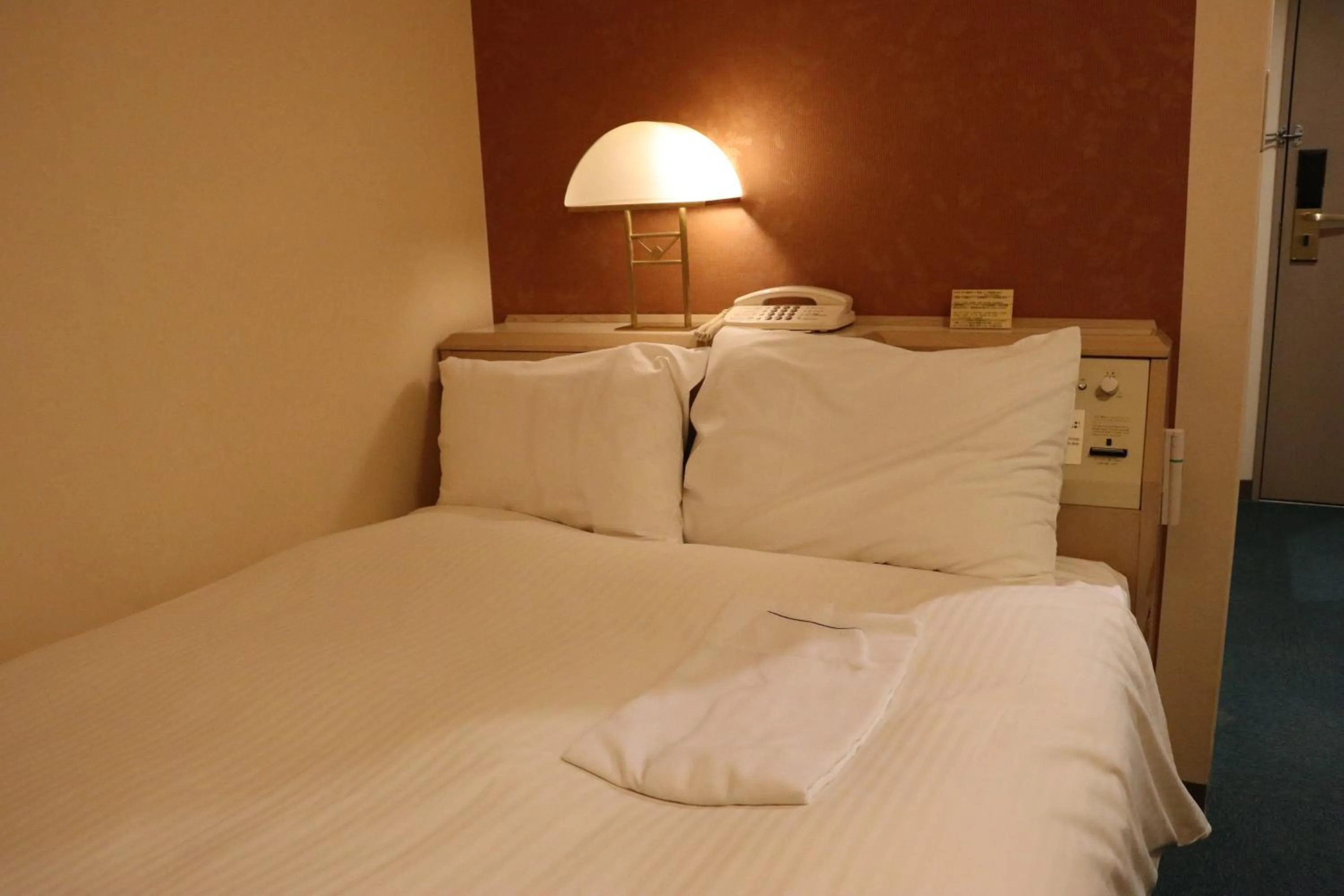 Bed in Aizuwakamatsu Washington Hotel