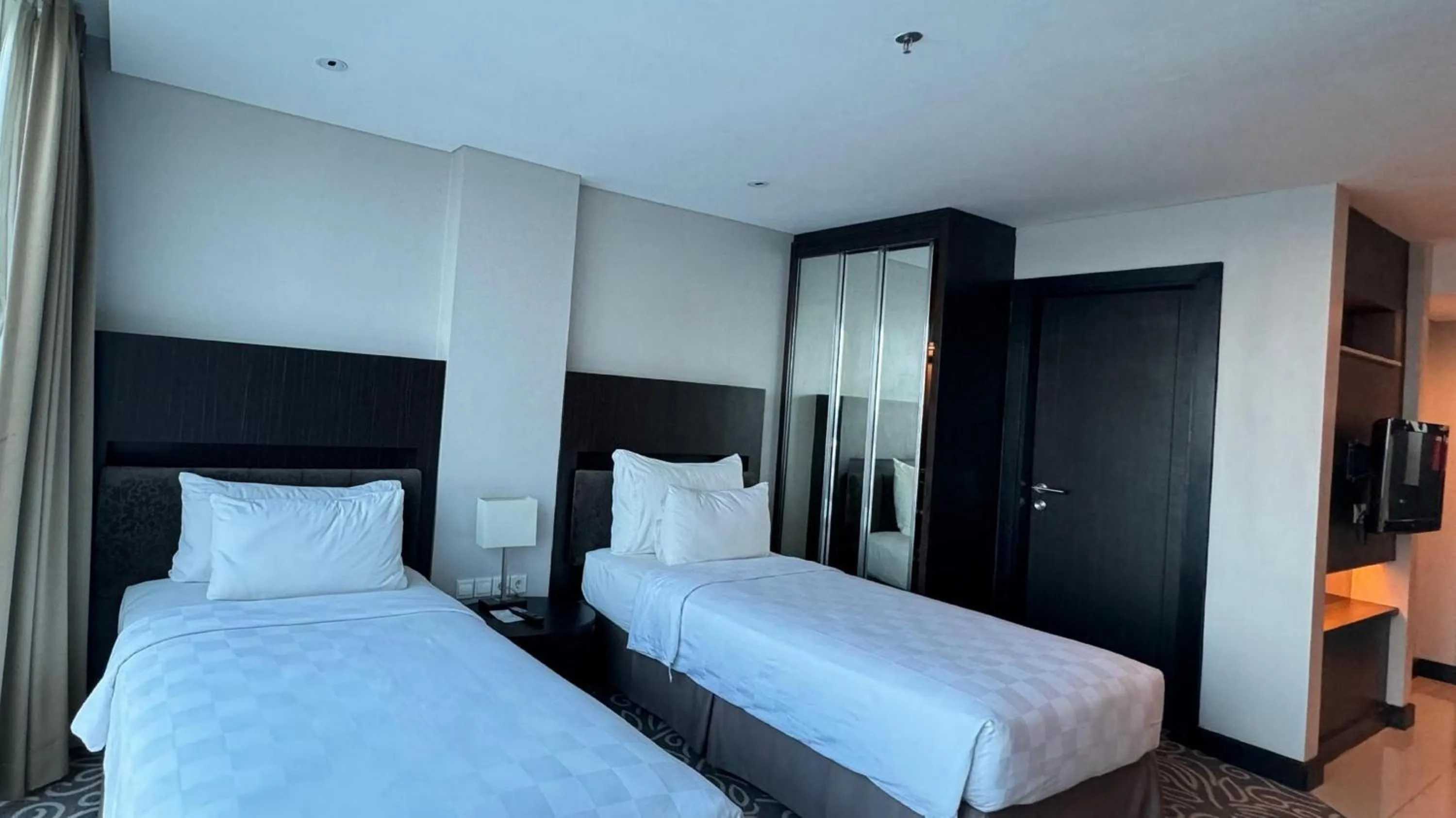 Bedroom, Bed in Swiss-Belhotel Balikpapan