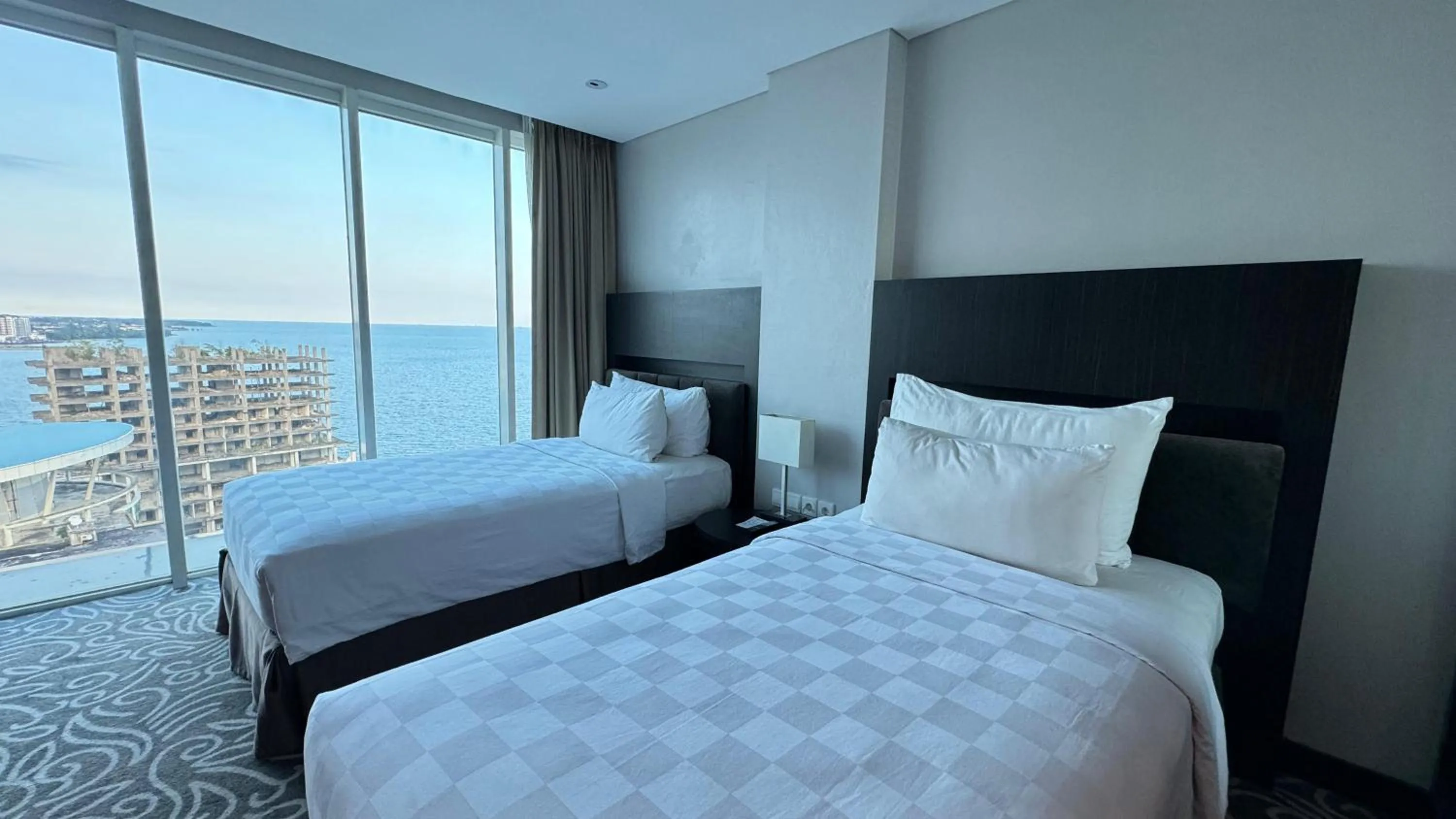 Bed in Swiss-Belhotel Balikpapan