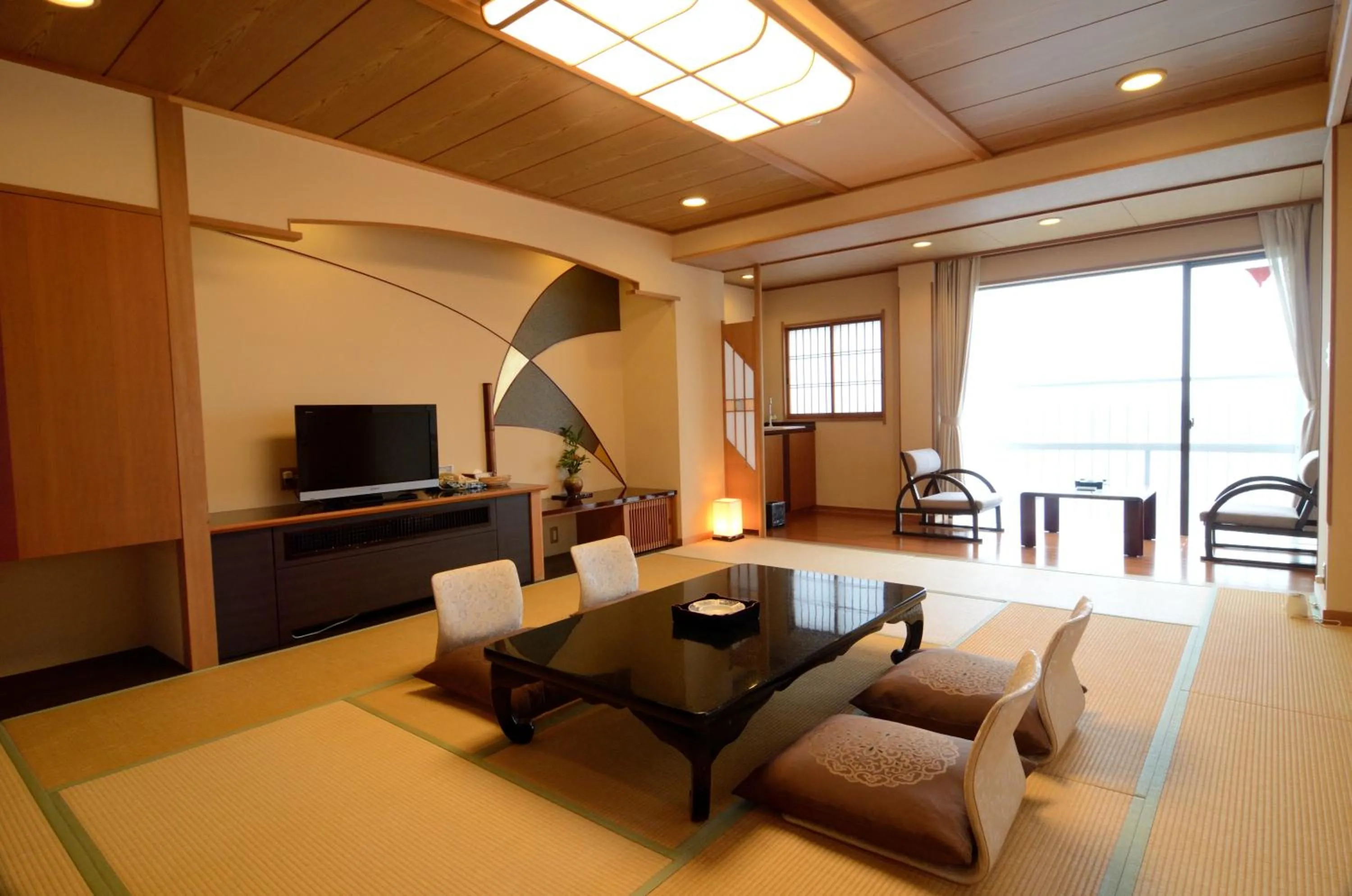 Living room, Bed in Inatori Tokai Hotel Yuen