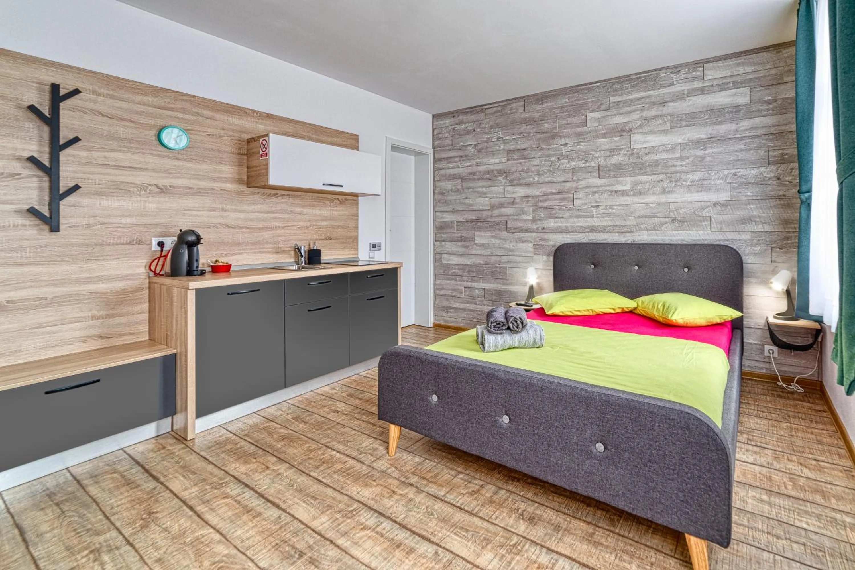 Photo of the whole room, Bed in T House