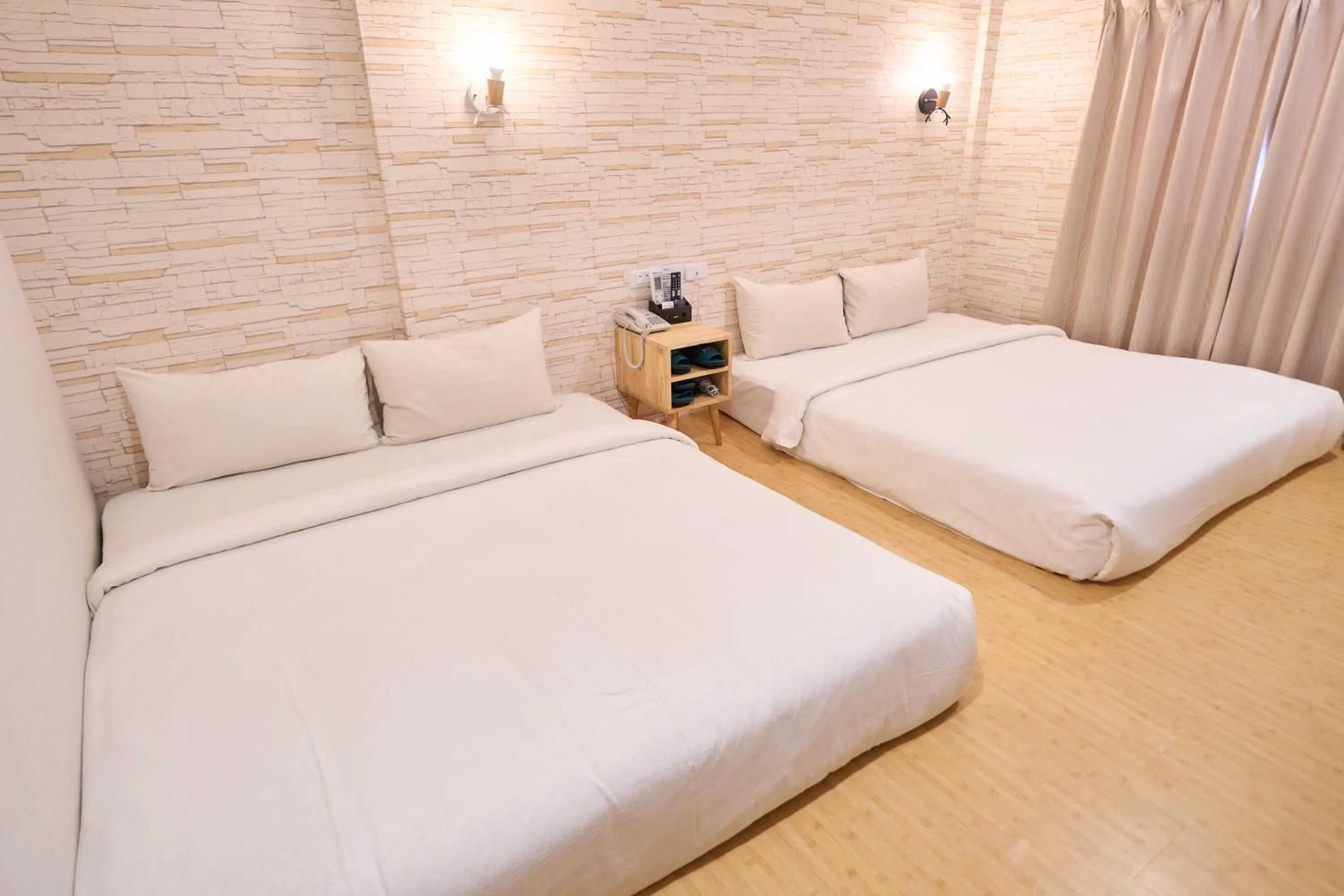 Bed in The Riverside Hotel Fashion