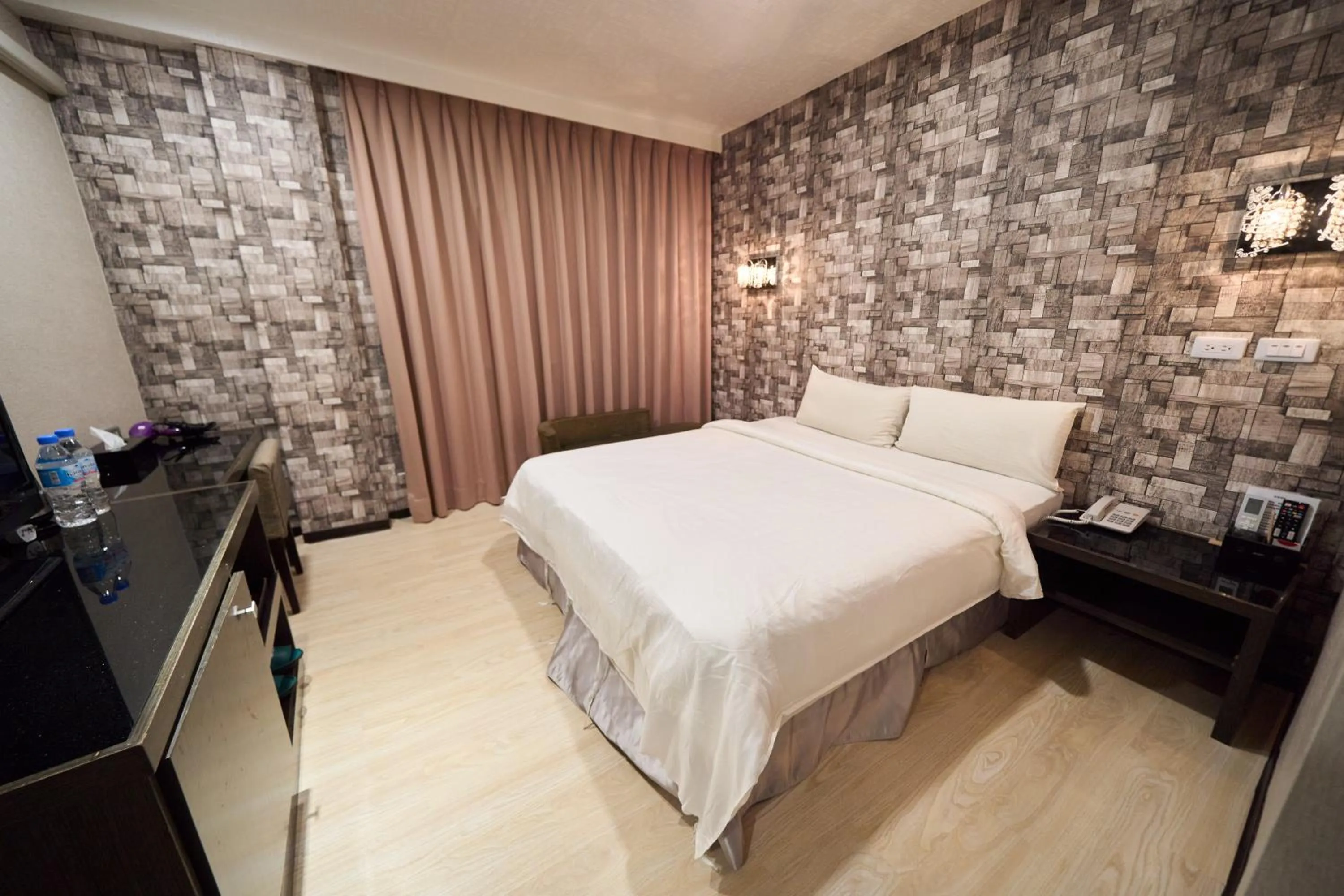 Bed in The Riverside Hotel Fashion