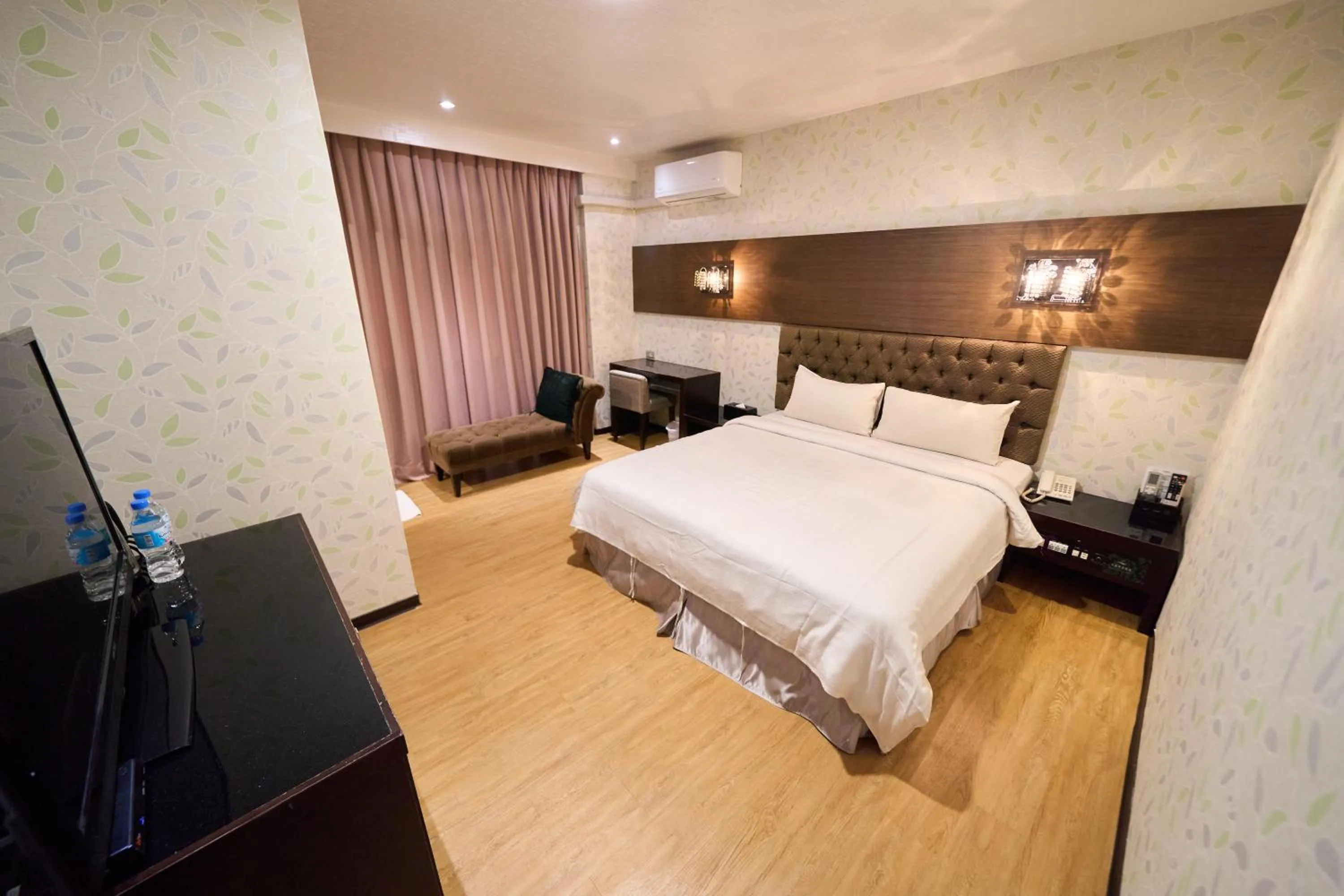 Bed in The Riverside Hotel Fashion