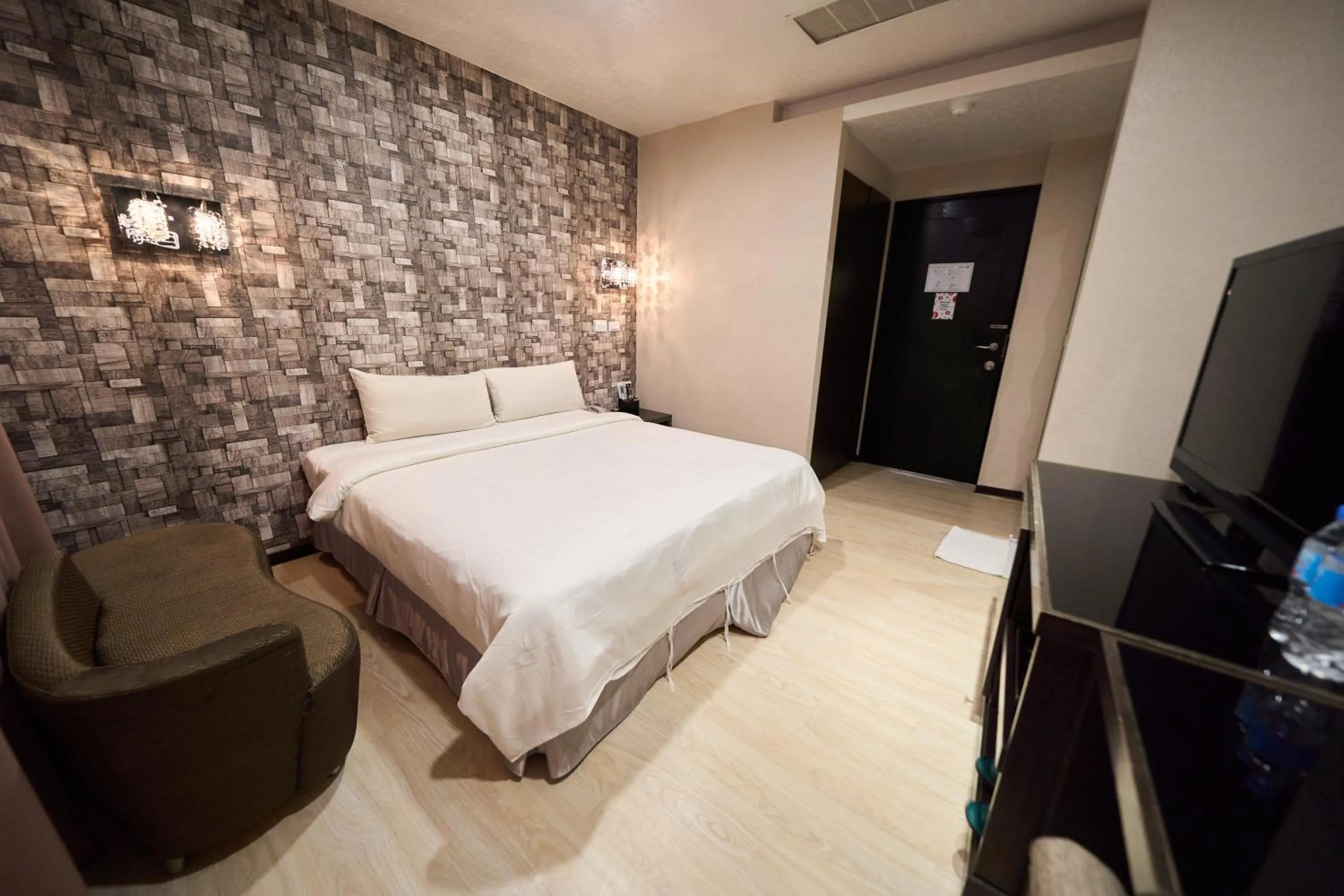 Bed in The Riverside Hotel Fashion