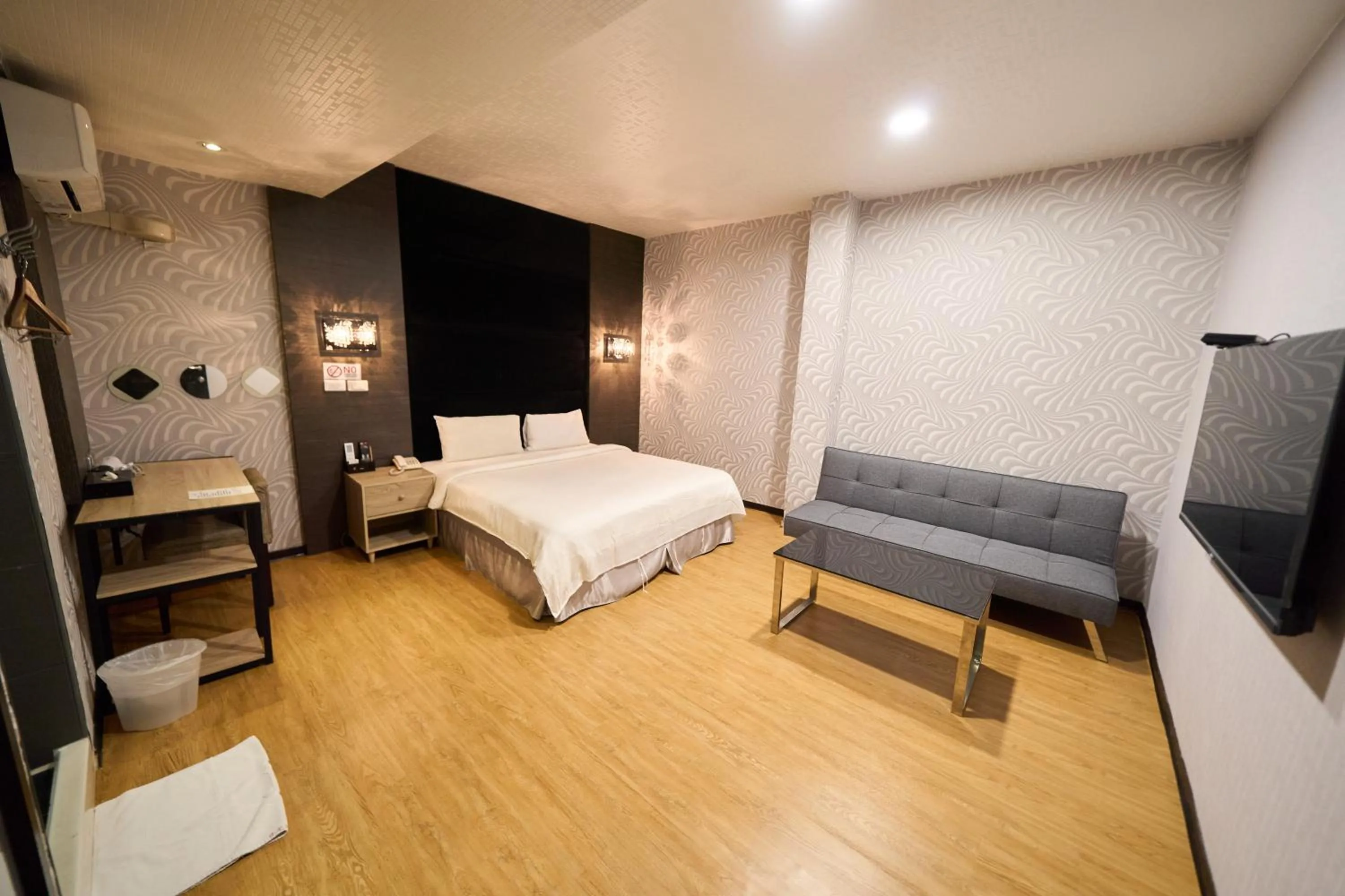 Bed in The Riverside Hotel Fashion