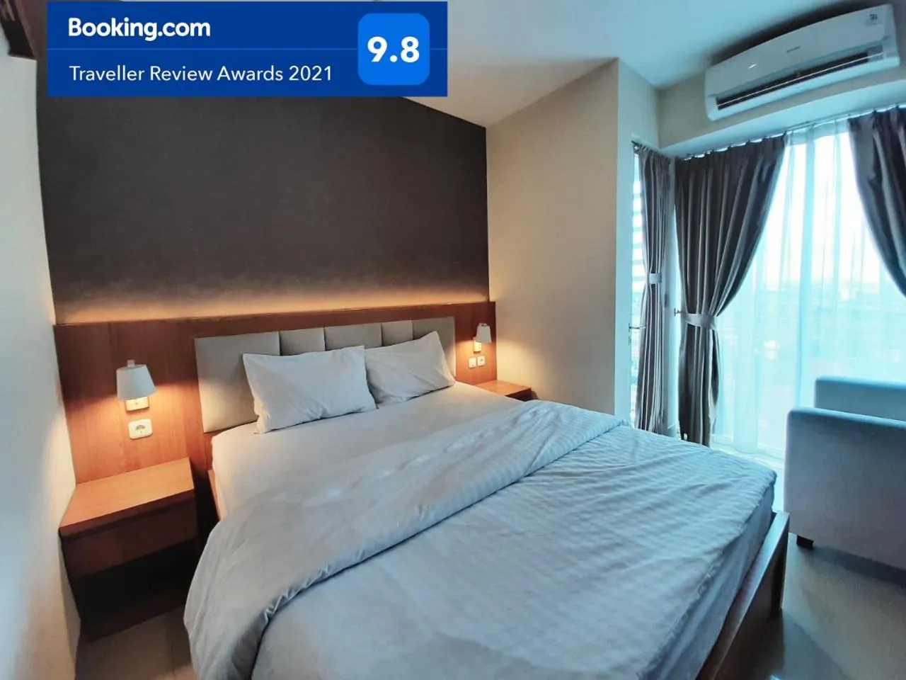 Bed in Apartemen Grand Kamala Lagoon Studio By Bonzela Property