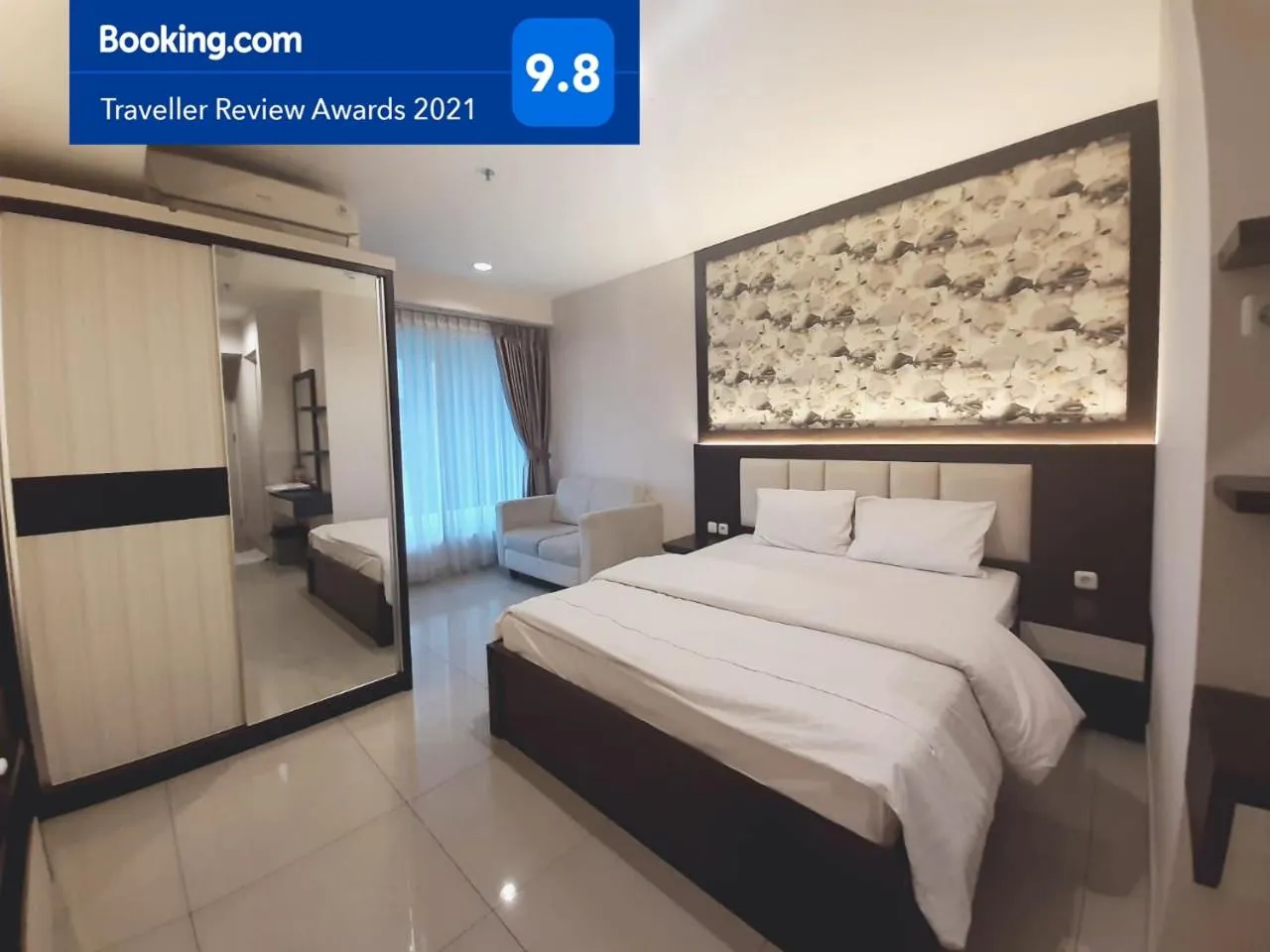 Bed in Apartemen Grand Kamala Lagoon Studio By Bonzela Property