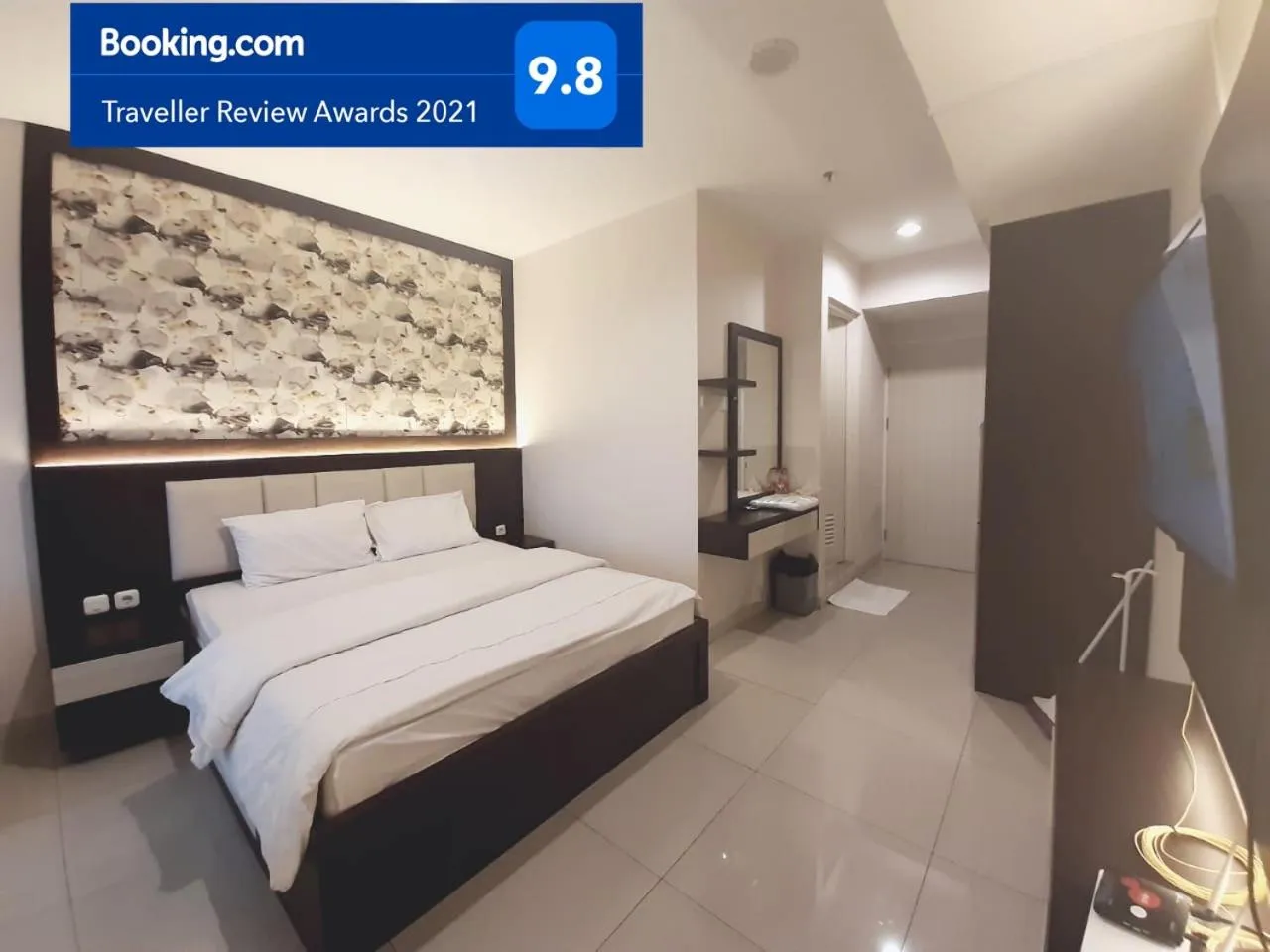 Bed in Apartemen Grand Kamala Lagoon Studio By Bonzela Property